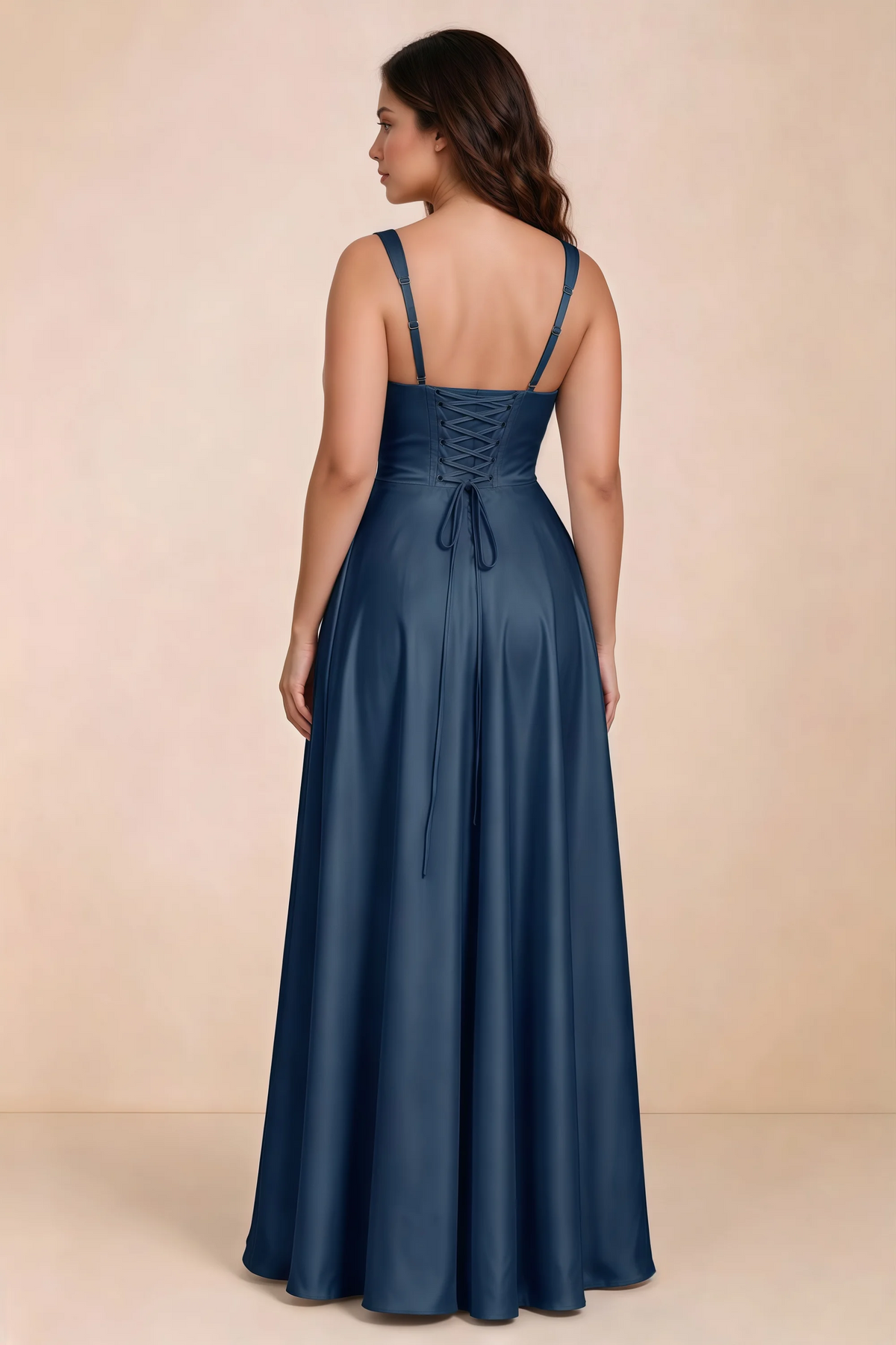 Rear studio view of Becky navy satin maxi dress showing crossed back lacing above the full skirt