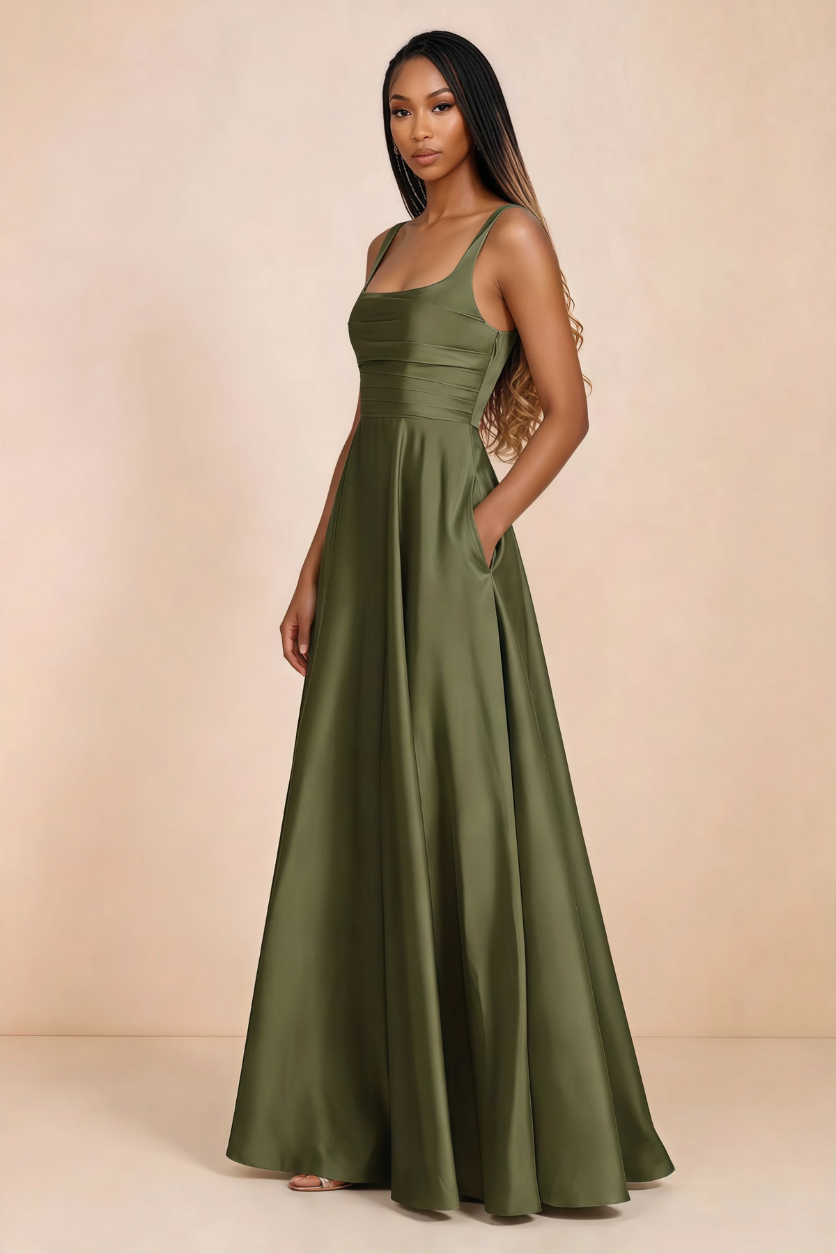 Three-quarter studio view of Becky olive satin maxi dress with a hand resting in the side pocket