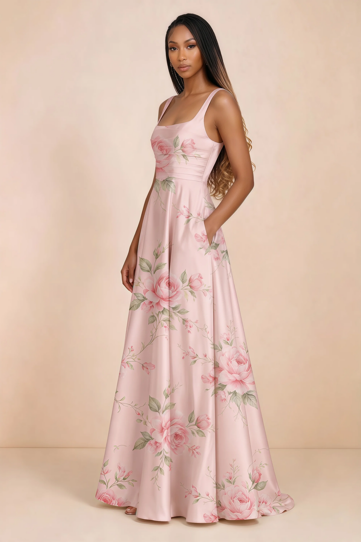 Three-quarter studio view of Becky pink floral satin maxi dress with a hand resting in the side pocket
