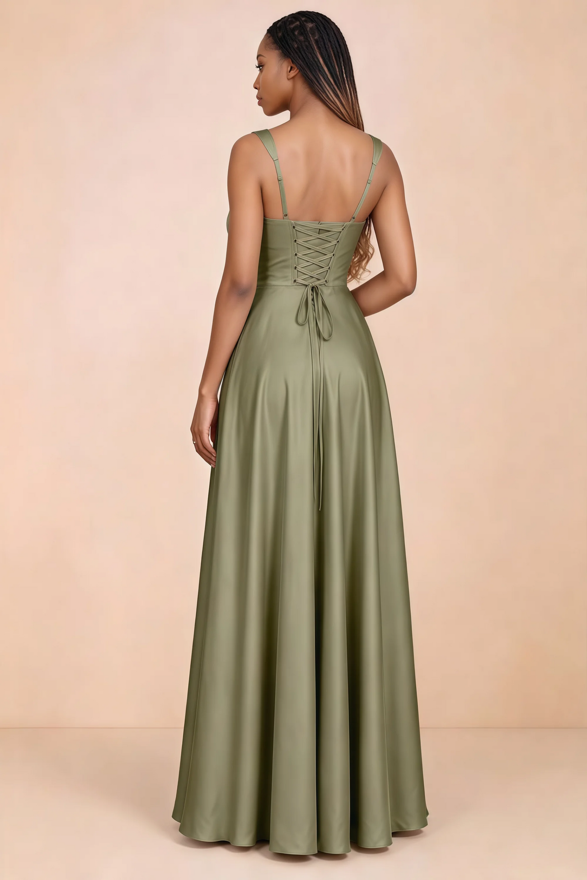 Back studio view of Becky pistachio satin maxi dress showing shoulder straps and waist-length lacing