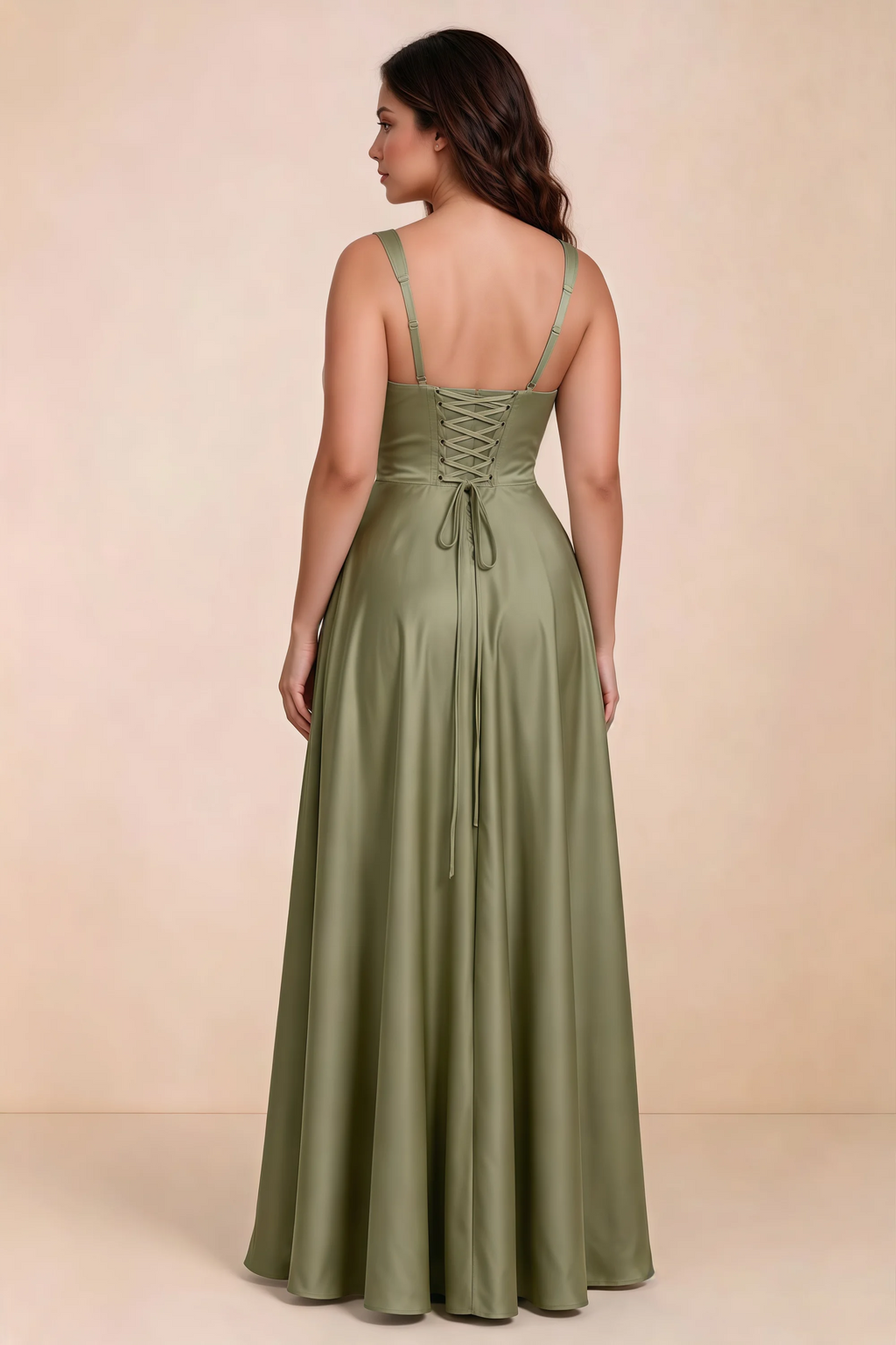 Rear studio view of Becky pistachio satin maxi dress showing crossed back lacing above the full skirt