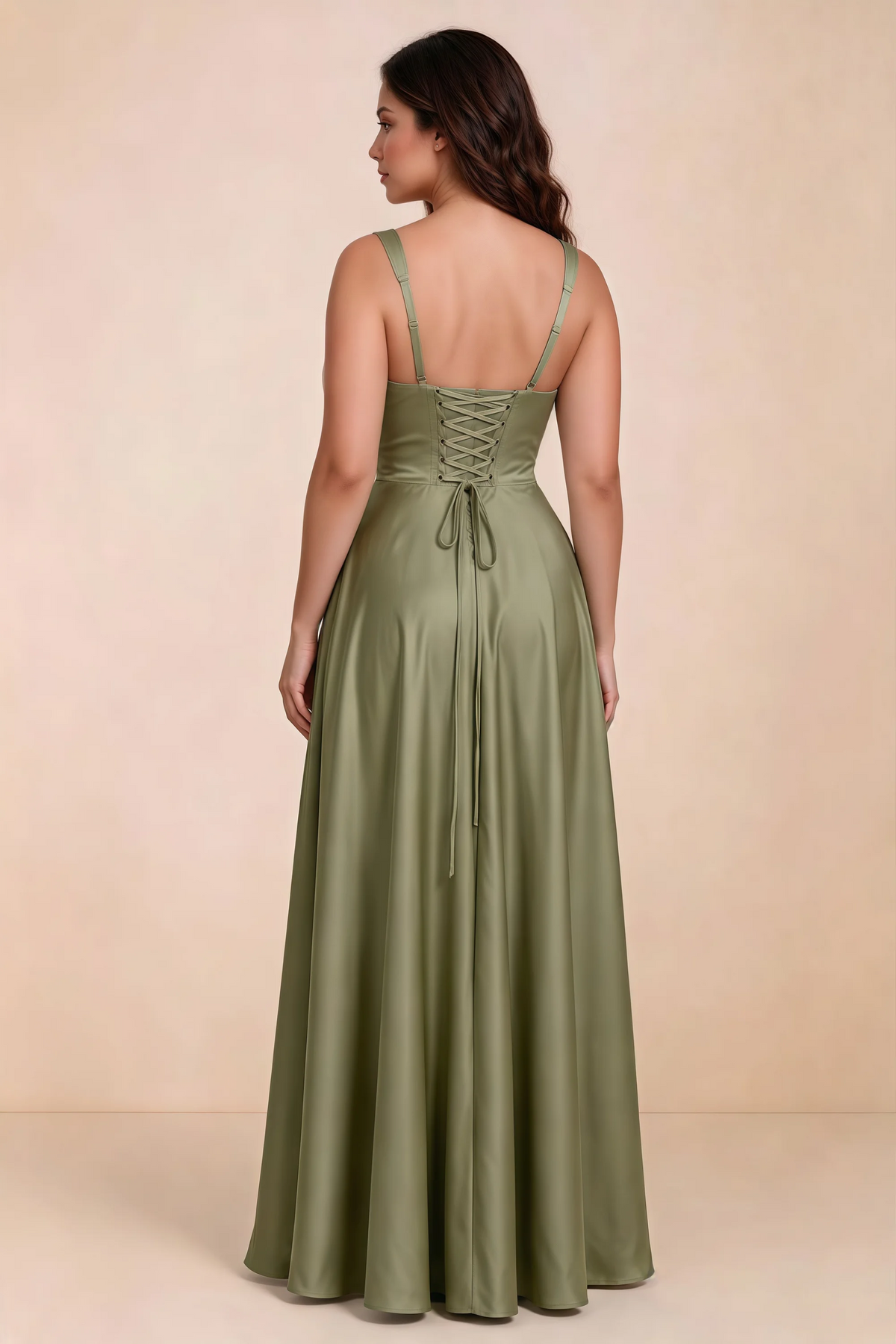 Rear studio view of Becky pistachio satin maxi dress showing crossed back lacing above the full skirt