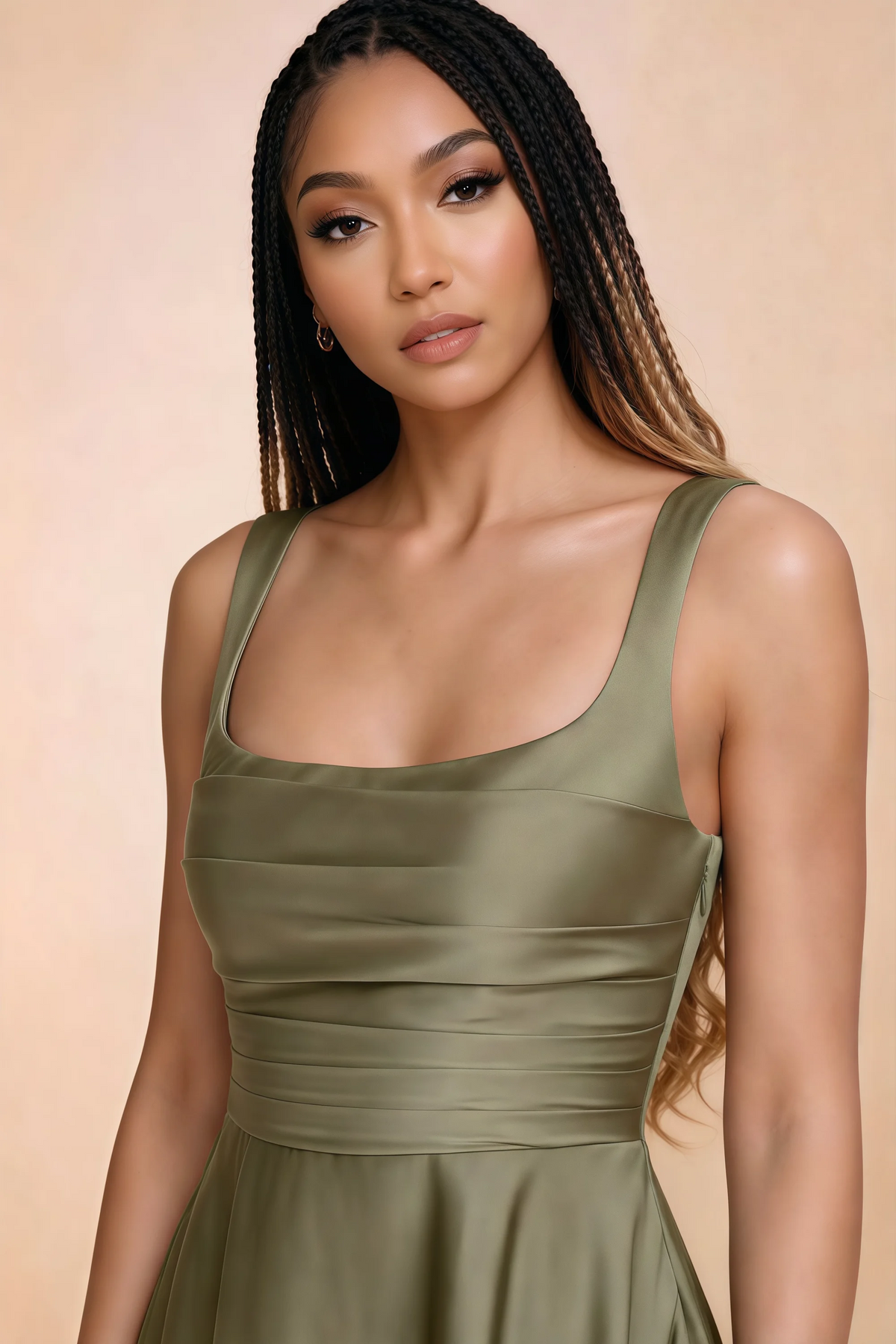 Close-up of Becky pistachio square neckline, shoulder straps and horizontal bodice pleats