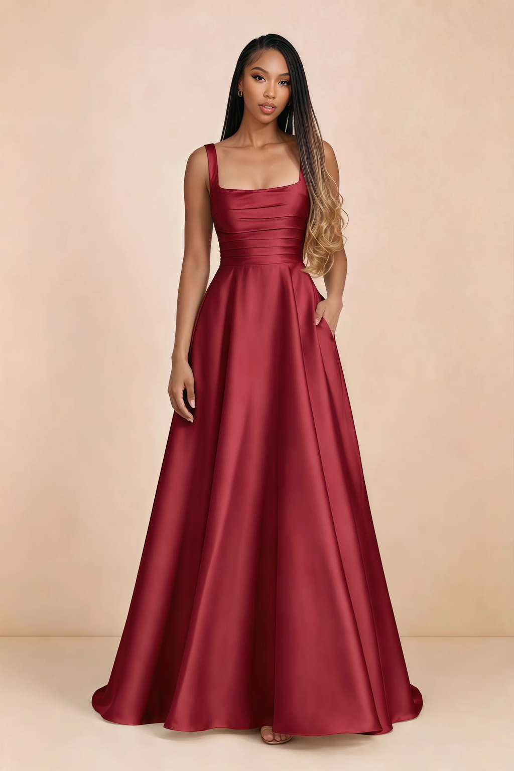 Front studio view of Becky red satin maxi dress showing the square neckline, pleated bodice and full A-line skirt