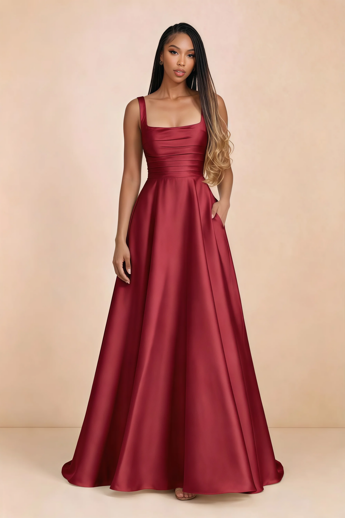 Front studio view of Becky red satin maxi dress showing the square neckline, pleated bodice and full A-line skirt