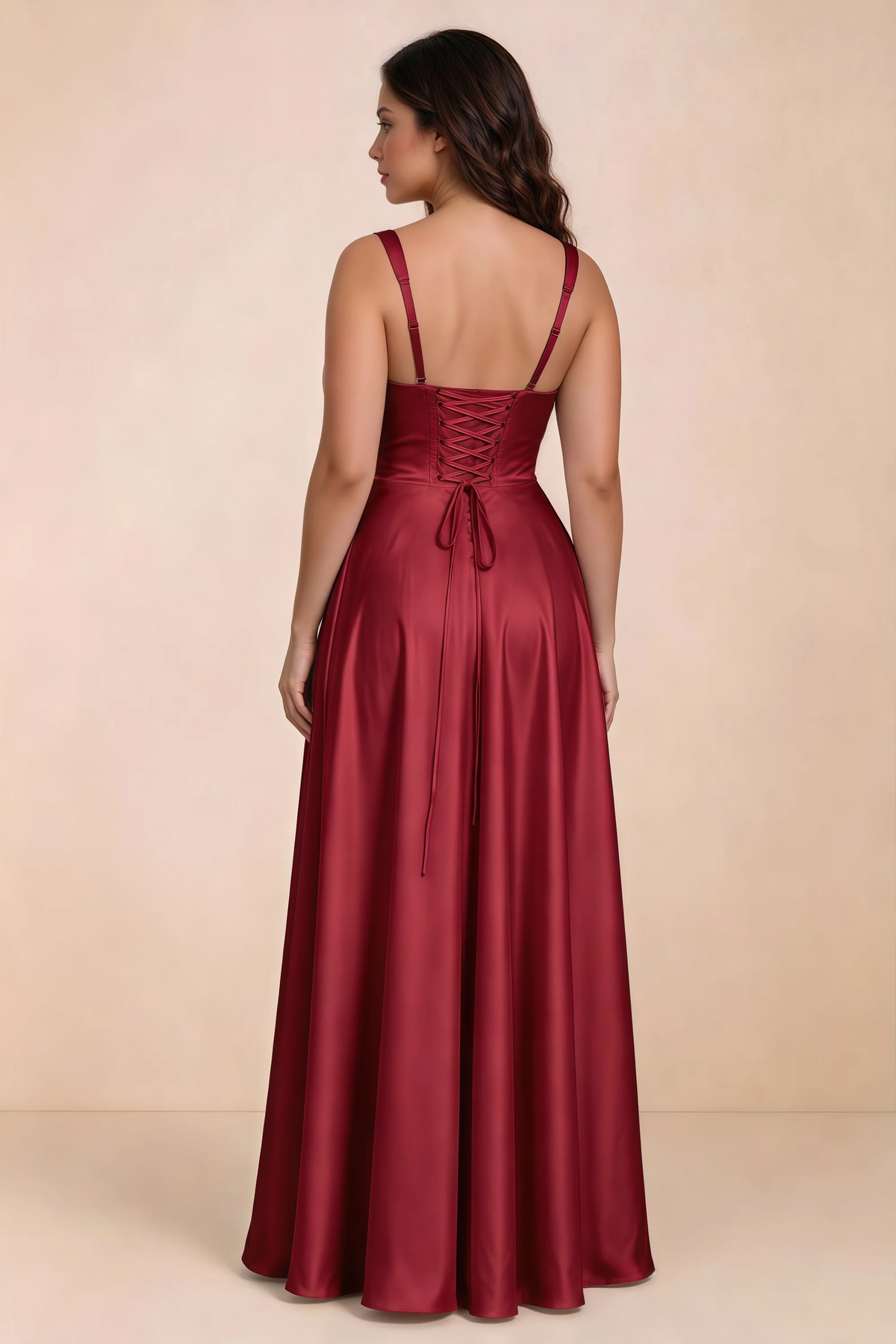 Rear studio view of Becky red satin maxi dress showing crossed back lacing above the full skirt
