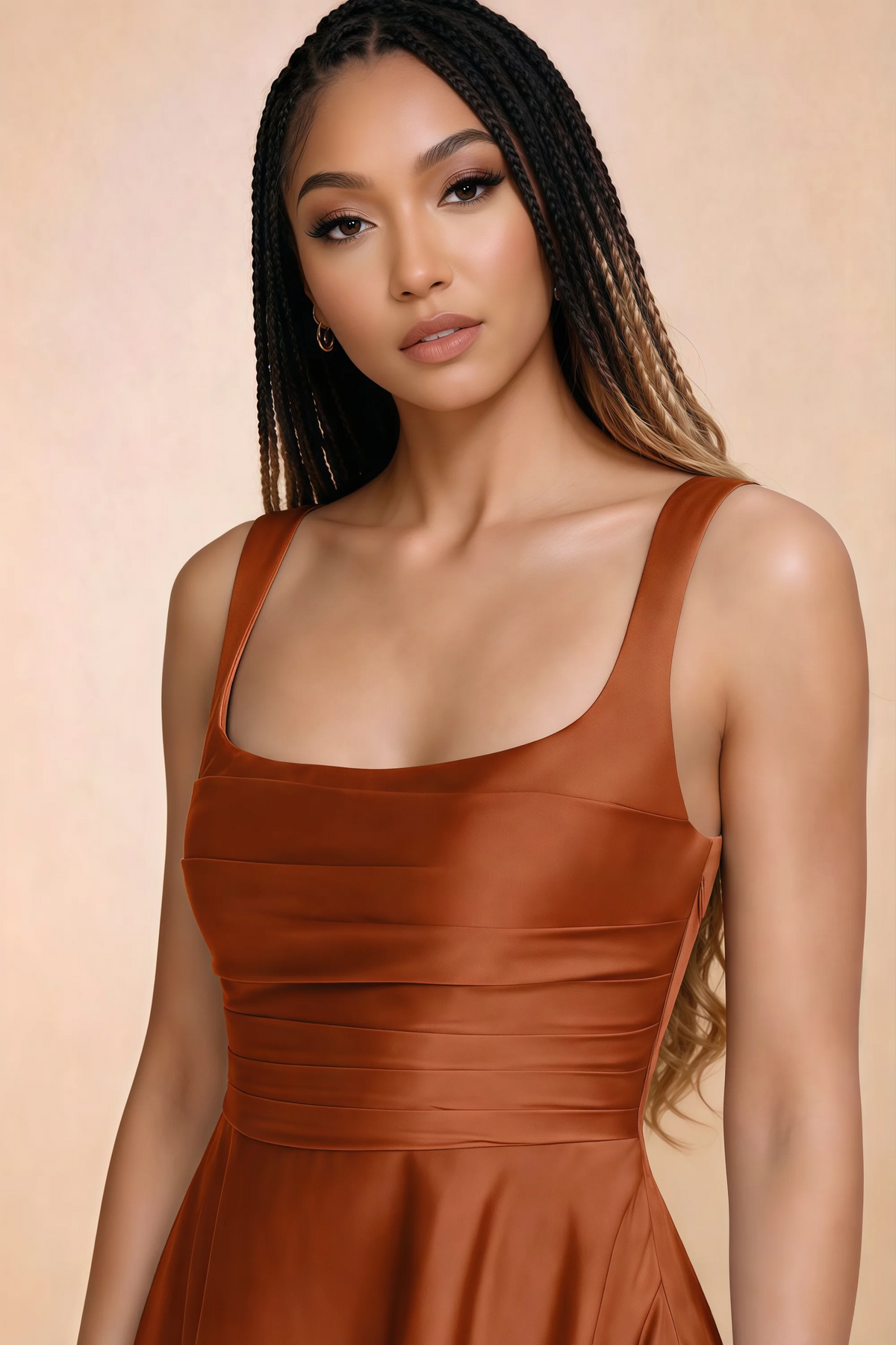 Close-up of Becky rust square neckline, shoulder straps and horizontal bodice pleats