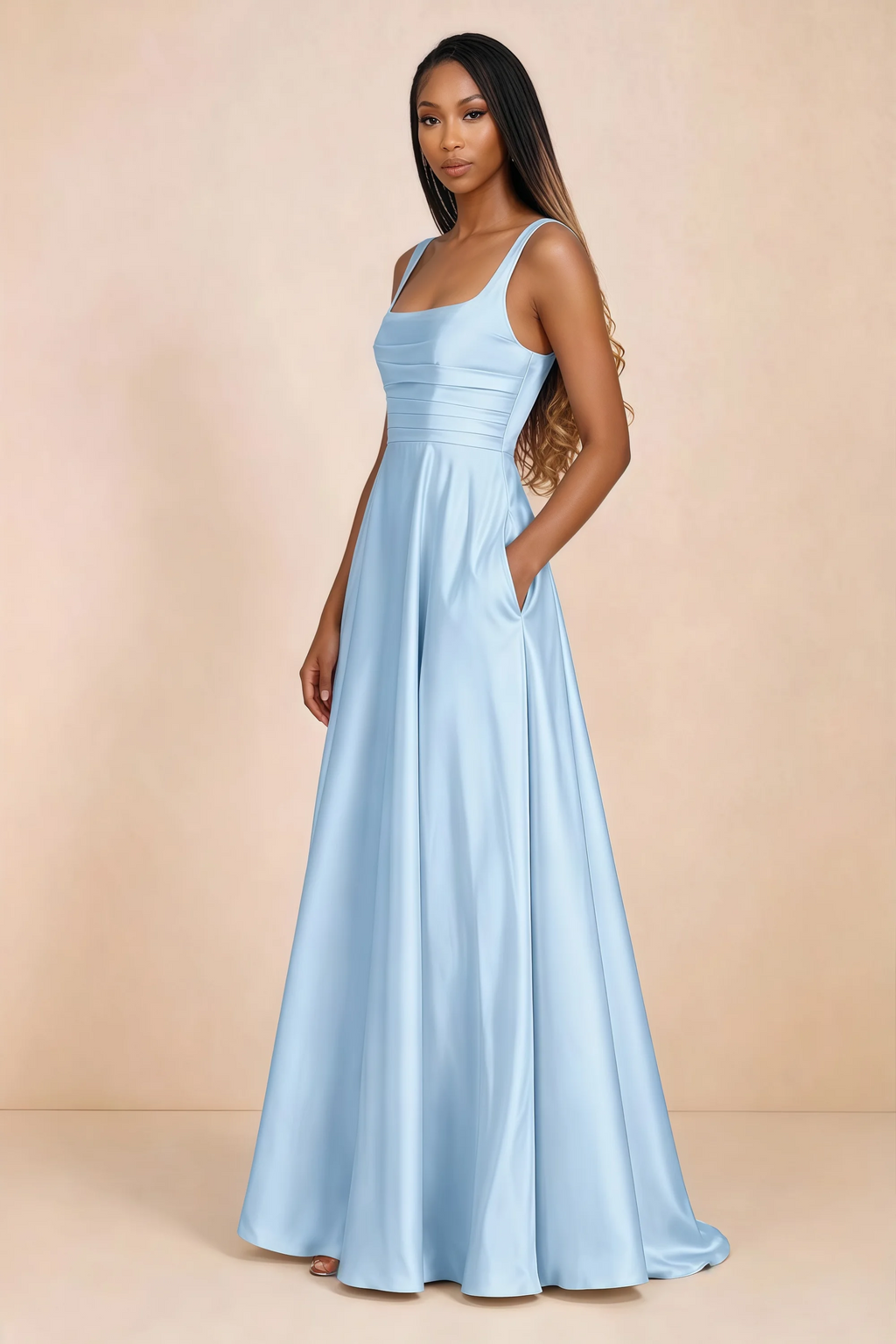 Three-quarter studio view of Becky sky blue satin maxi dress with a hand resting in the side pocket