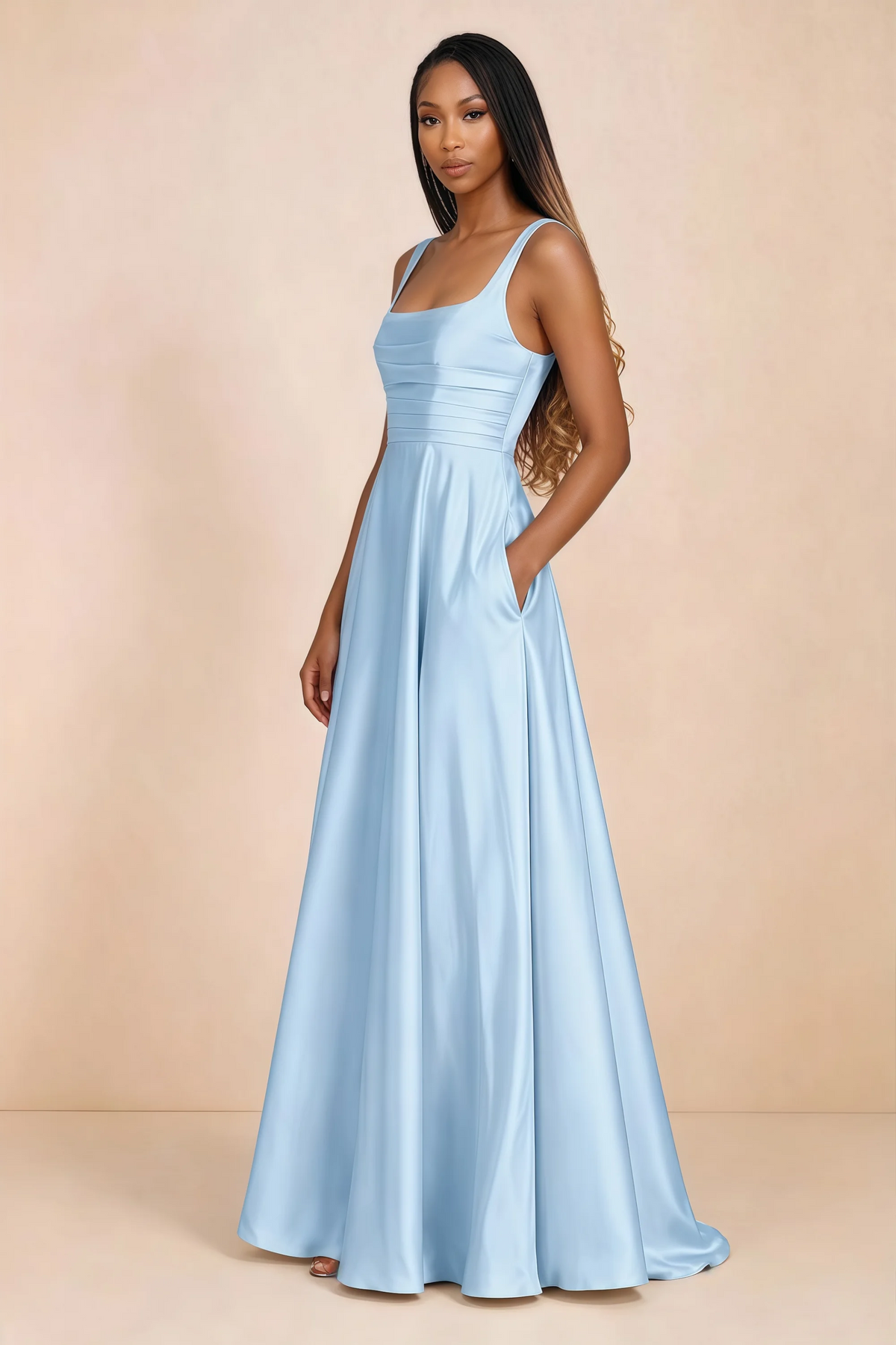 Three-quarter studio view of Becky sky blue satin maxi dress with a hand resting in the side pocket