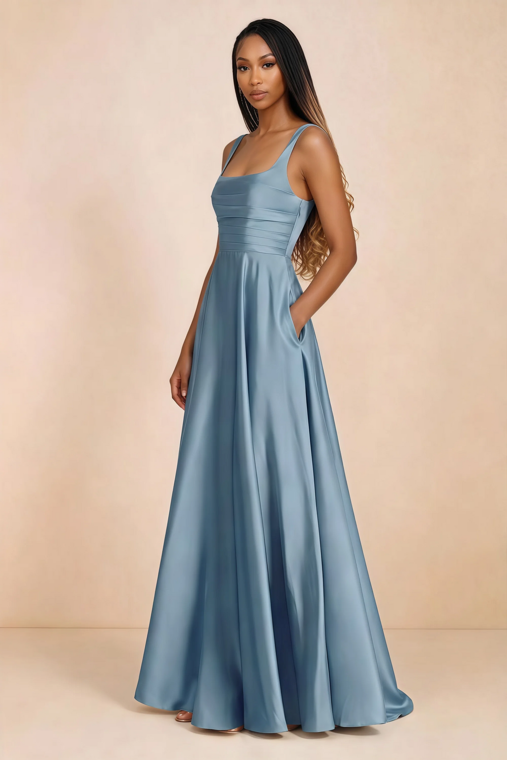 Three-quarter studio view of Becky steel blue satin maxi dress with a hand resting in the side pocket