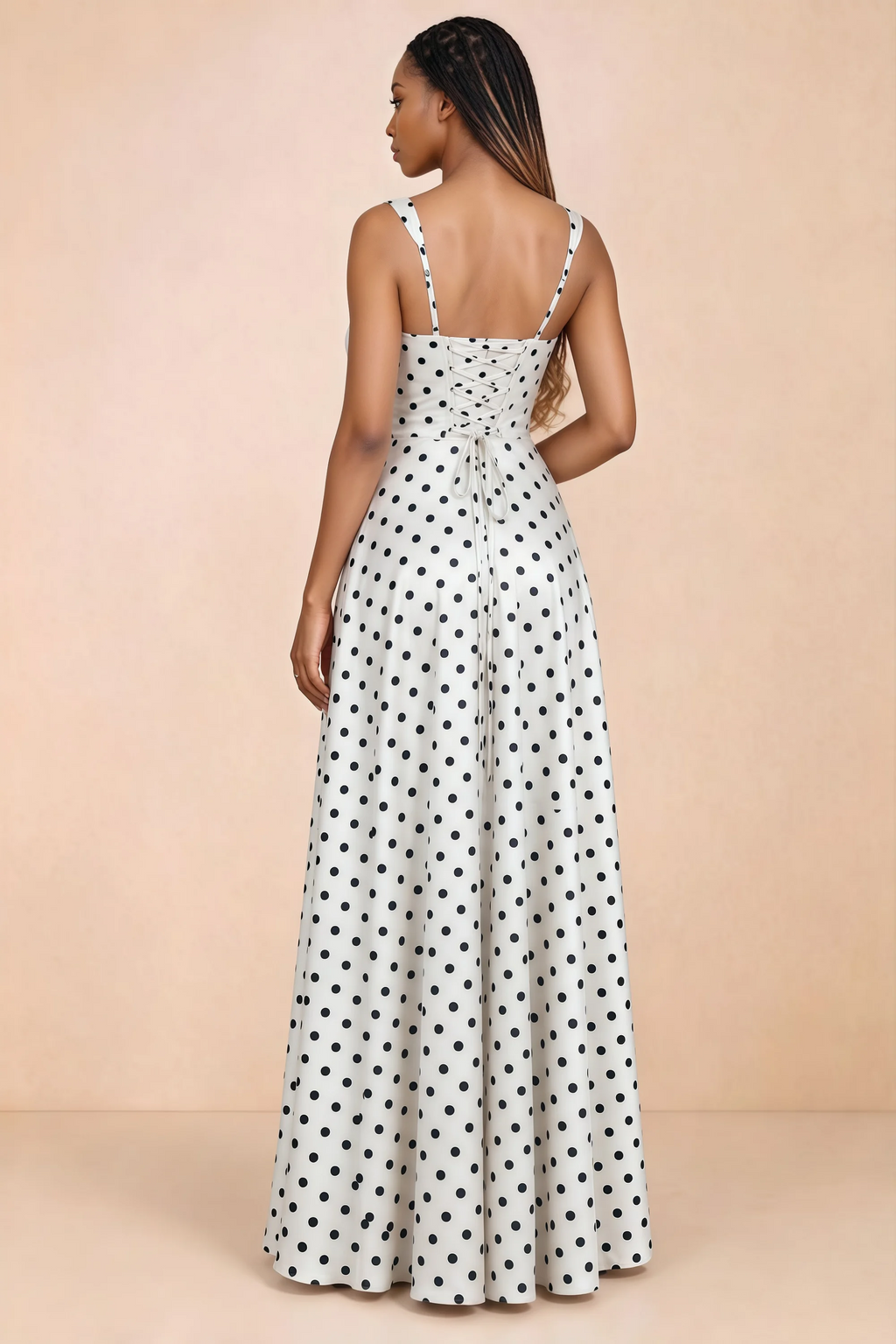 Back studio view of Becky white polka dot satin maxi dress showing shoulder straps and waist-length lacing