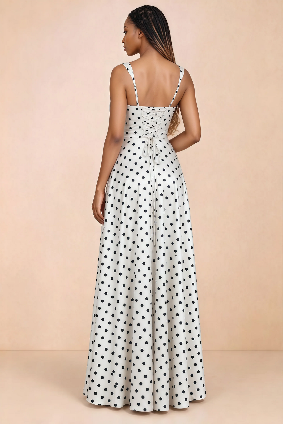 Back studio view of Becky white polka dot satin maxi dress showing shoulder straps and waist-length lacing