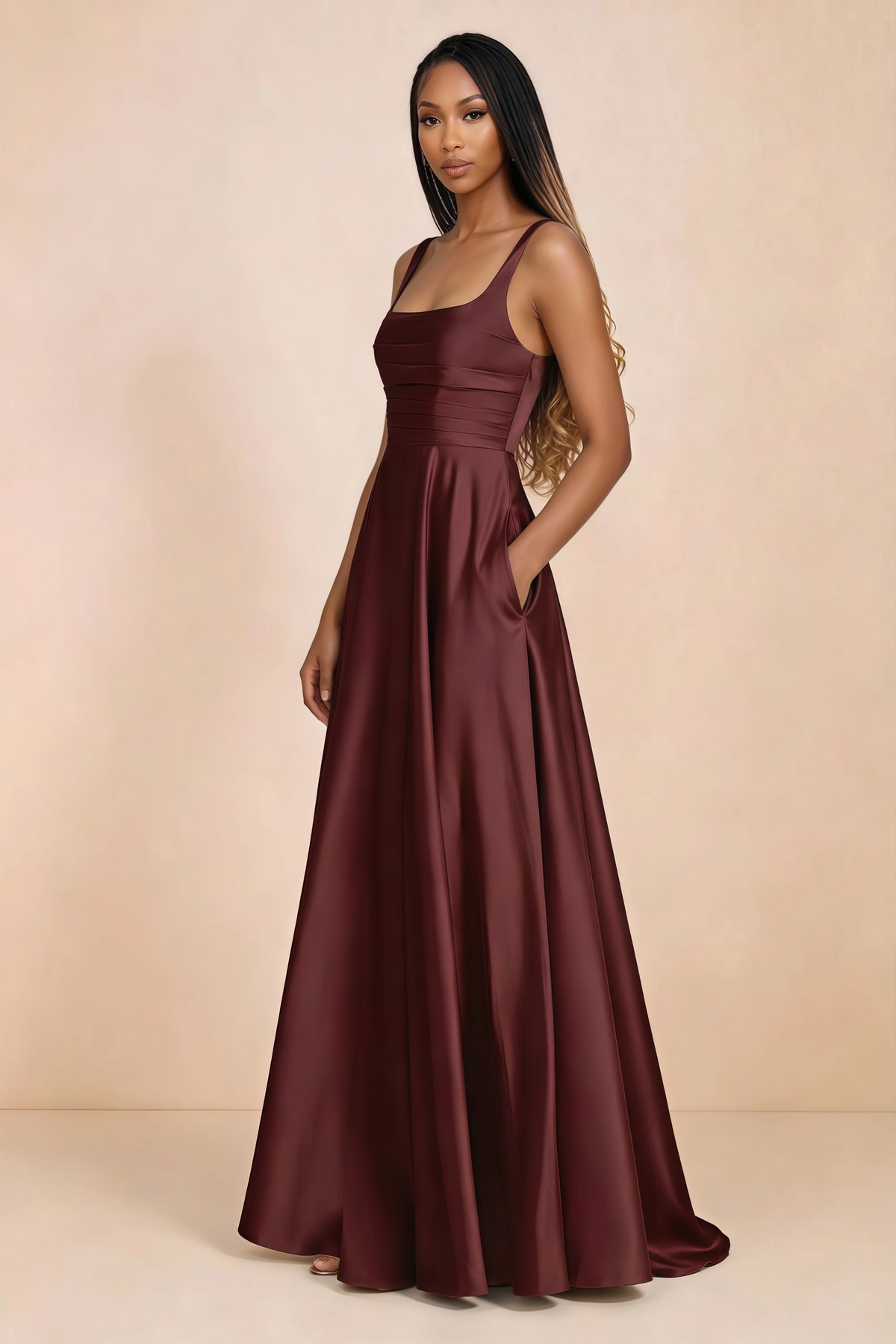 Three-quarter studio view of Becky wine satin maxi dress with a hand resting in the side pocket