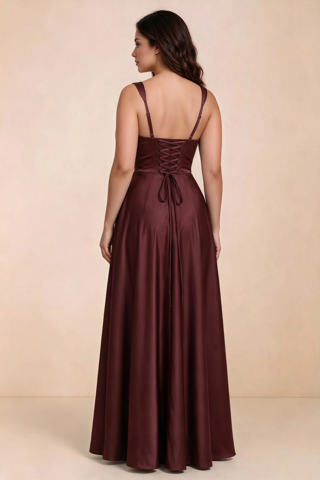 Rear studio view of Becky wine satin maxi dress showing crossed back lacing above the full skirt