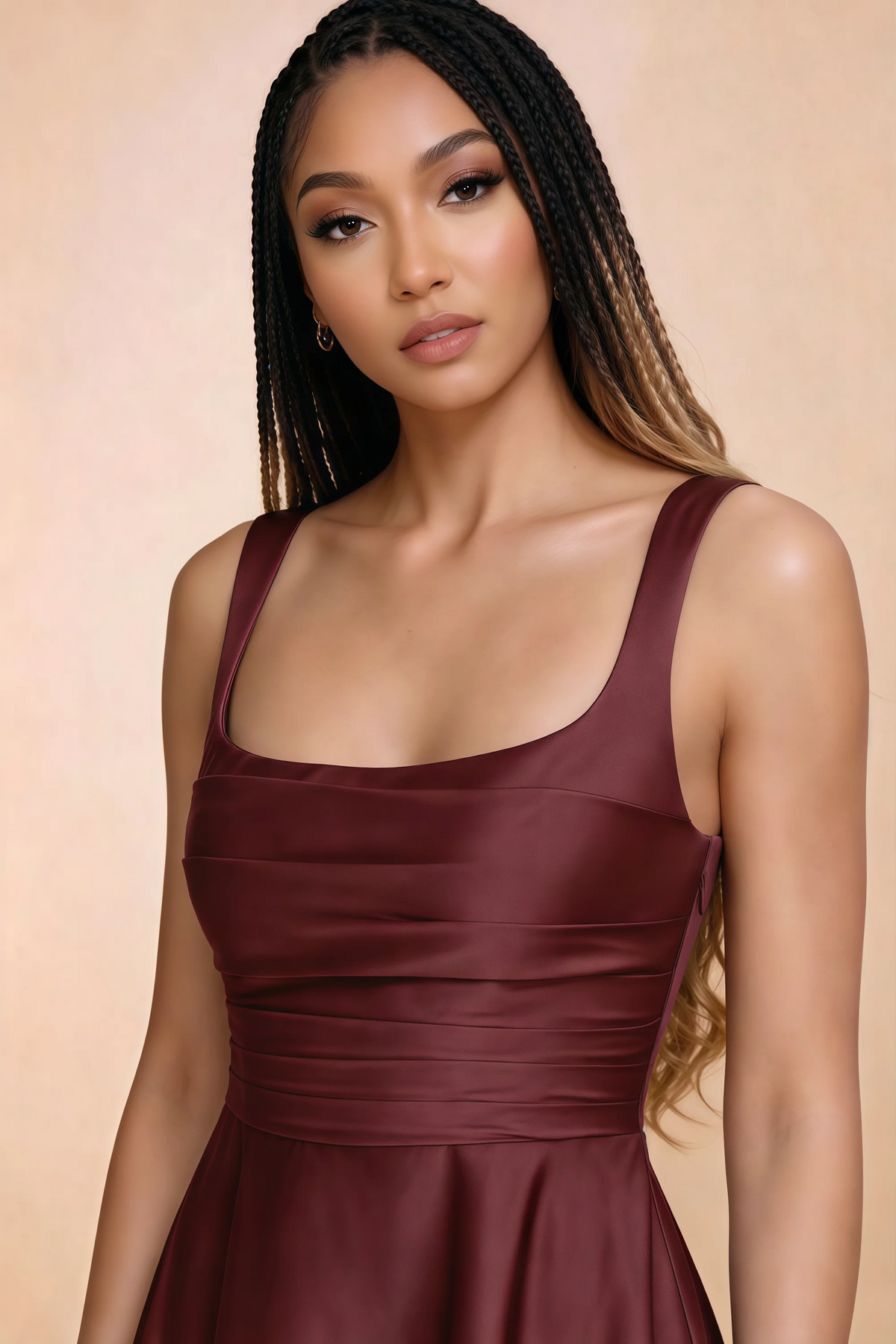 Close-up of Becky wine square neckline, shoulder straps and horizontal bodice pleats