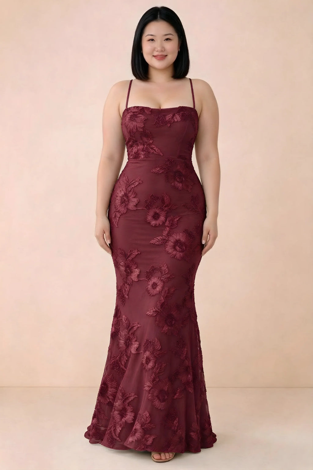 Front studio view of Belinda burgundy floral maxi dress showing the close-fitting bodice and long skirt