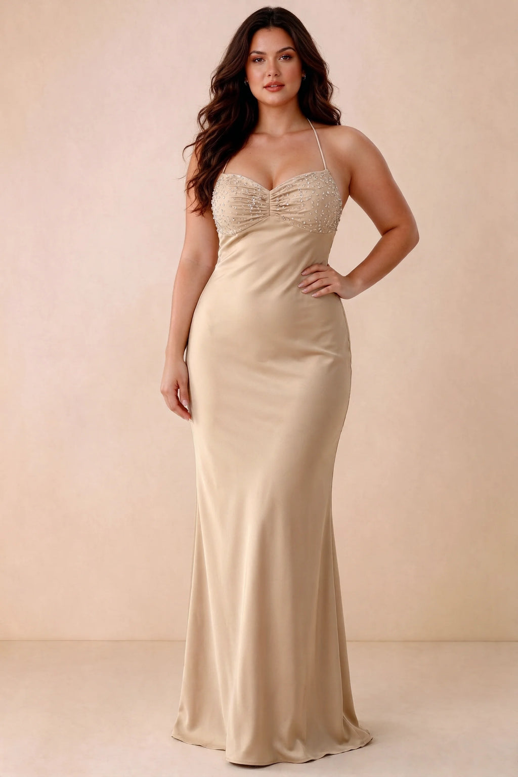 Front studio view of Blanche champagne maxi dress showing the ruched beaded bodice and smooth skirt