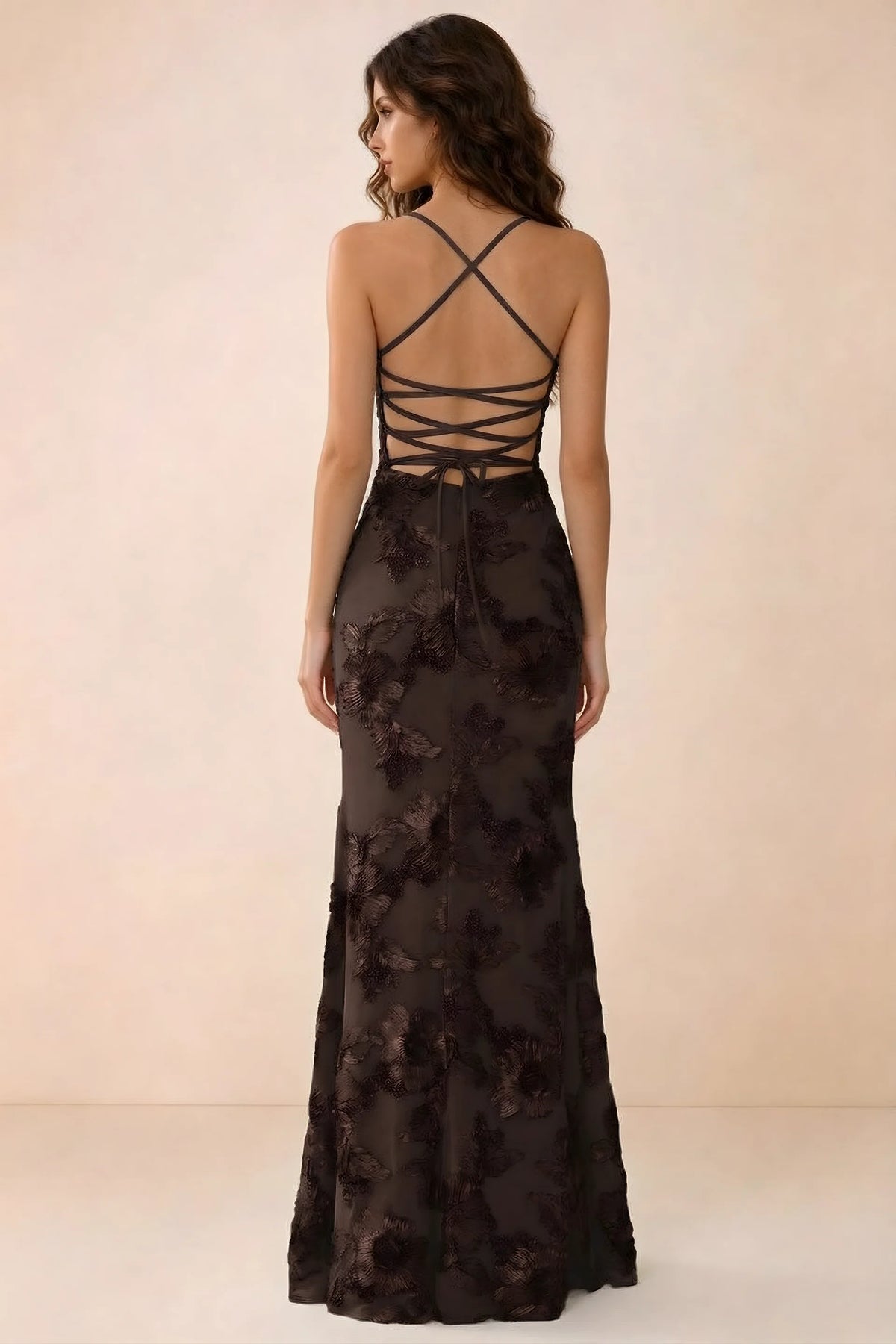 Back studio view of Belinda chocolate maxi dress showing crossed straps and open-back ties
