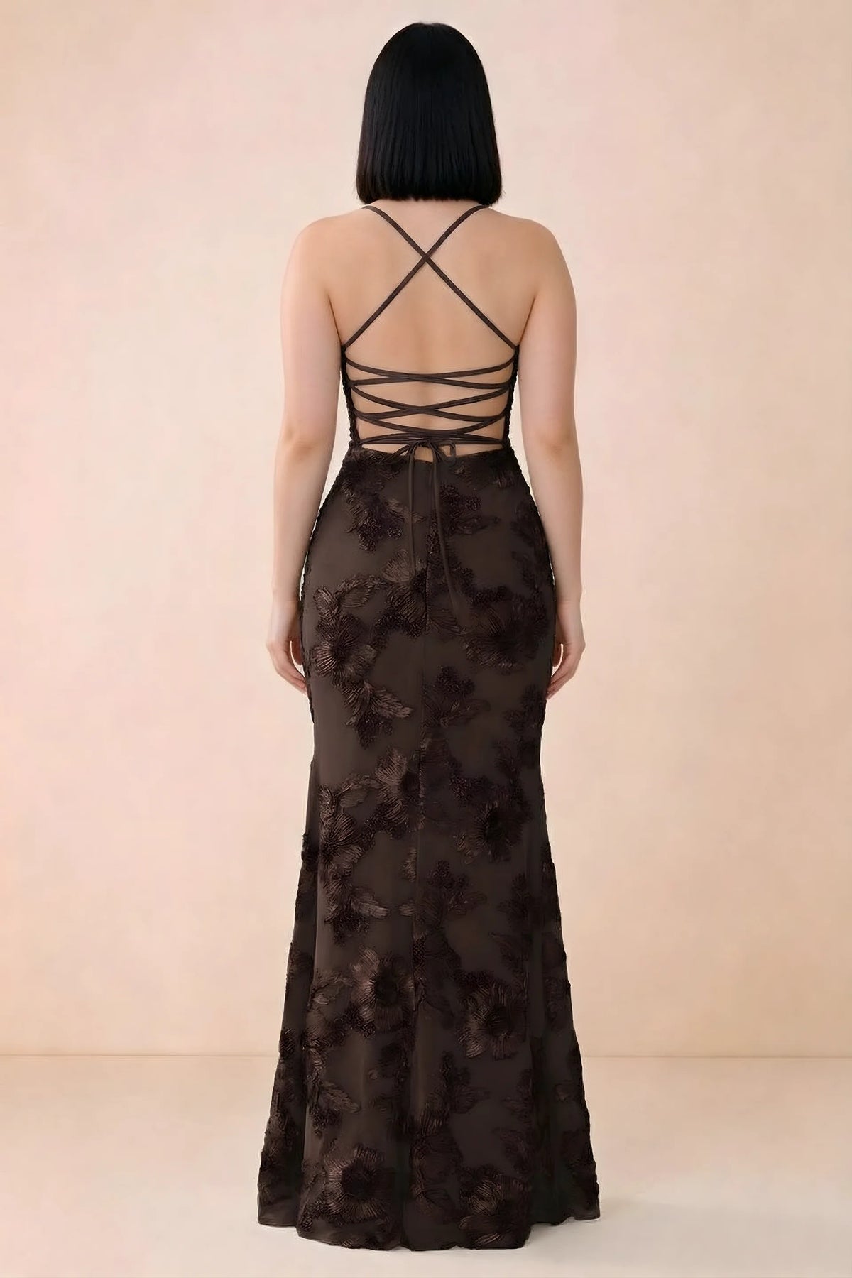 Rear studio view of Belinda chocolate dress showing the open back and gently flared skirt