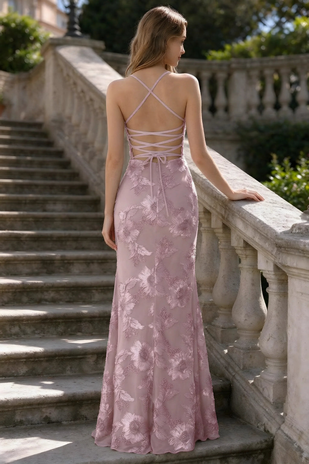 Outdoor rear view of Belinda dusty lilac mermaid maxi dress showing the crisscross back ties