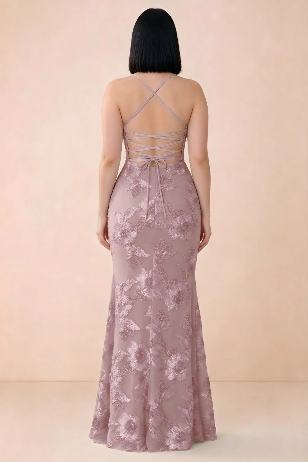 Rear studio view of Belinda dusty lilac dress showing the open back and gently flared skirt