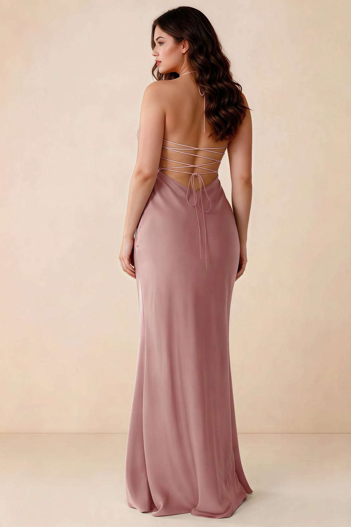 Rear studio view of Blanche dusty pink satin dress showing the open back and mermaid silhouette