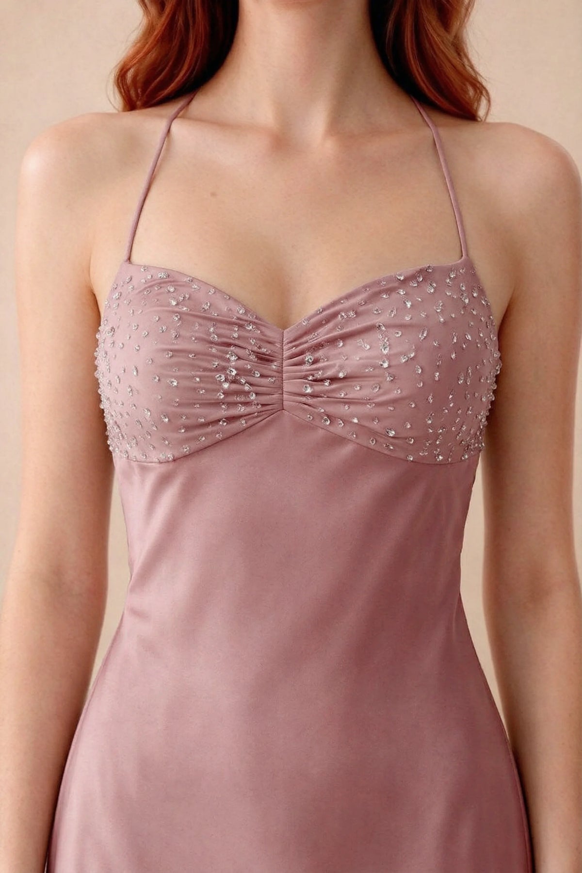 Close-up of Blanche dusty pink sweetheart neckline with beading, central ruching and fine halter straps