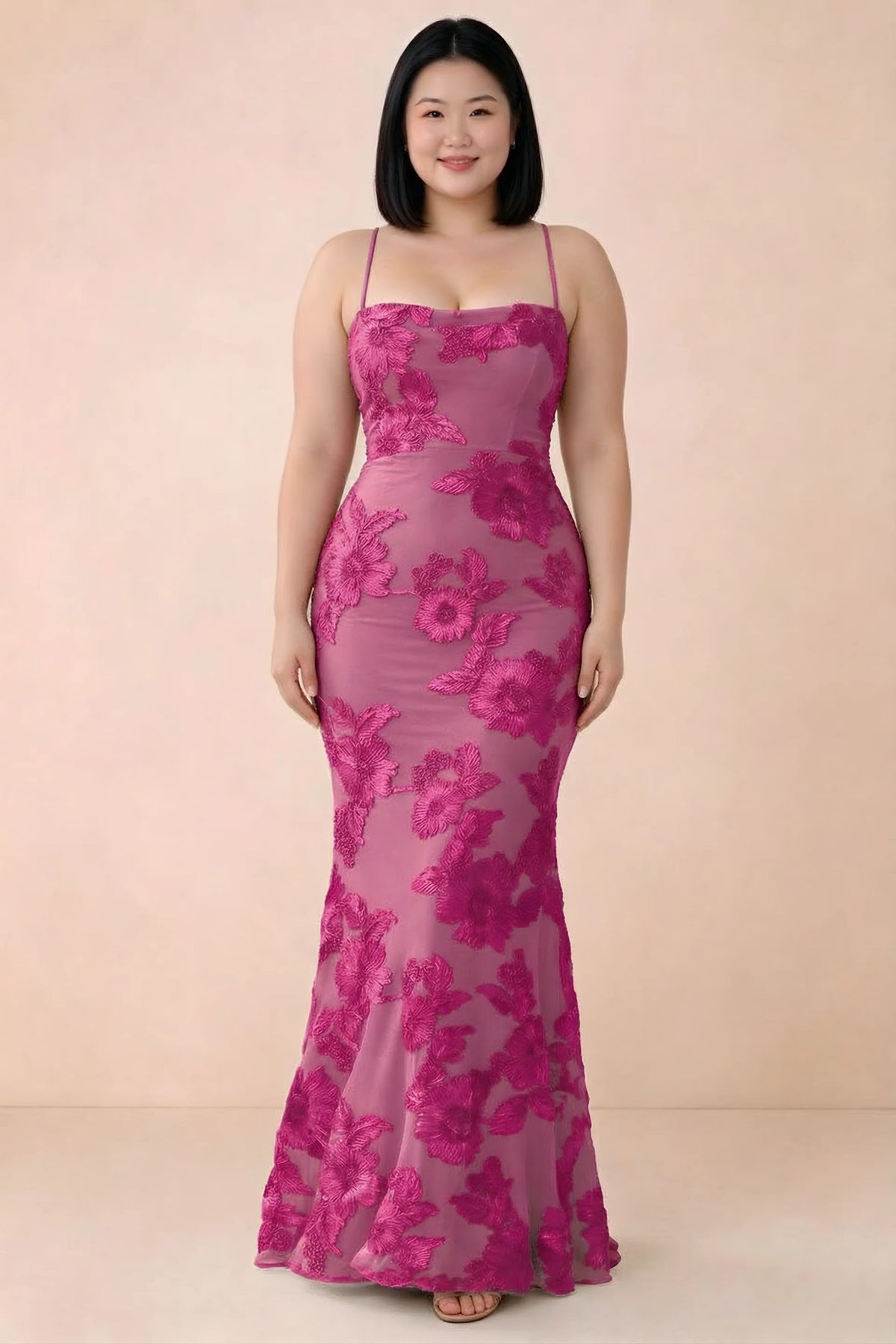 Front studio view of Belinda fuchsia floral maxi dress showing the close-fitting bodice and long skirt