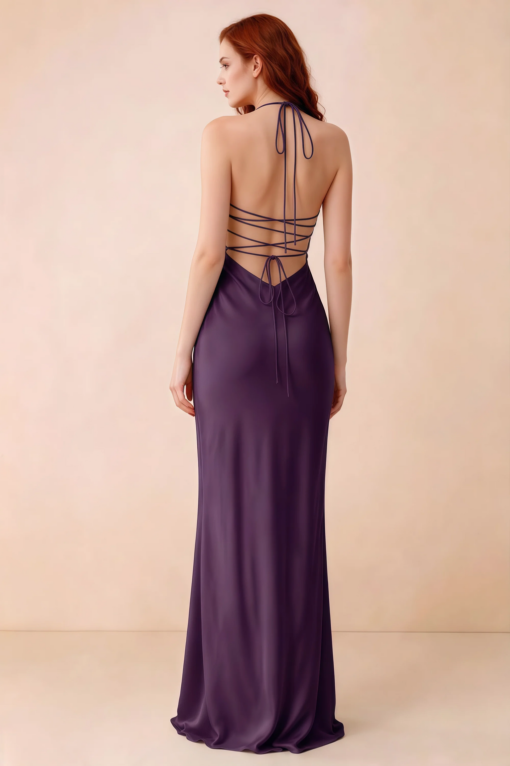 Back studio view of Blanche grape dress showing halter neck ties and crossed open-back lacing