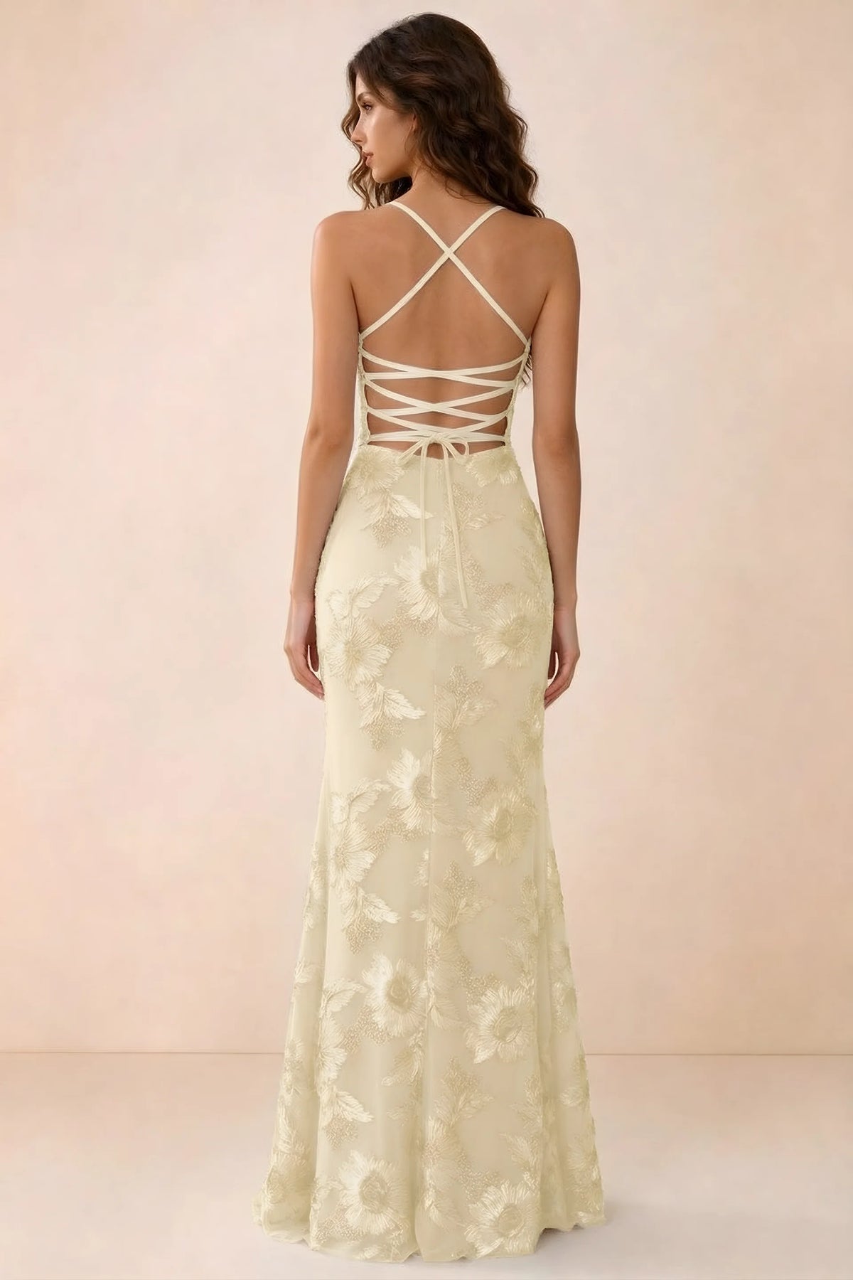 Back studio view of Belinda lemon maxi dress showing crossed straps and open-back ties