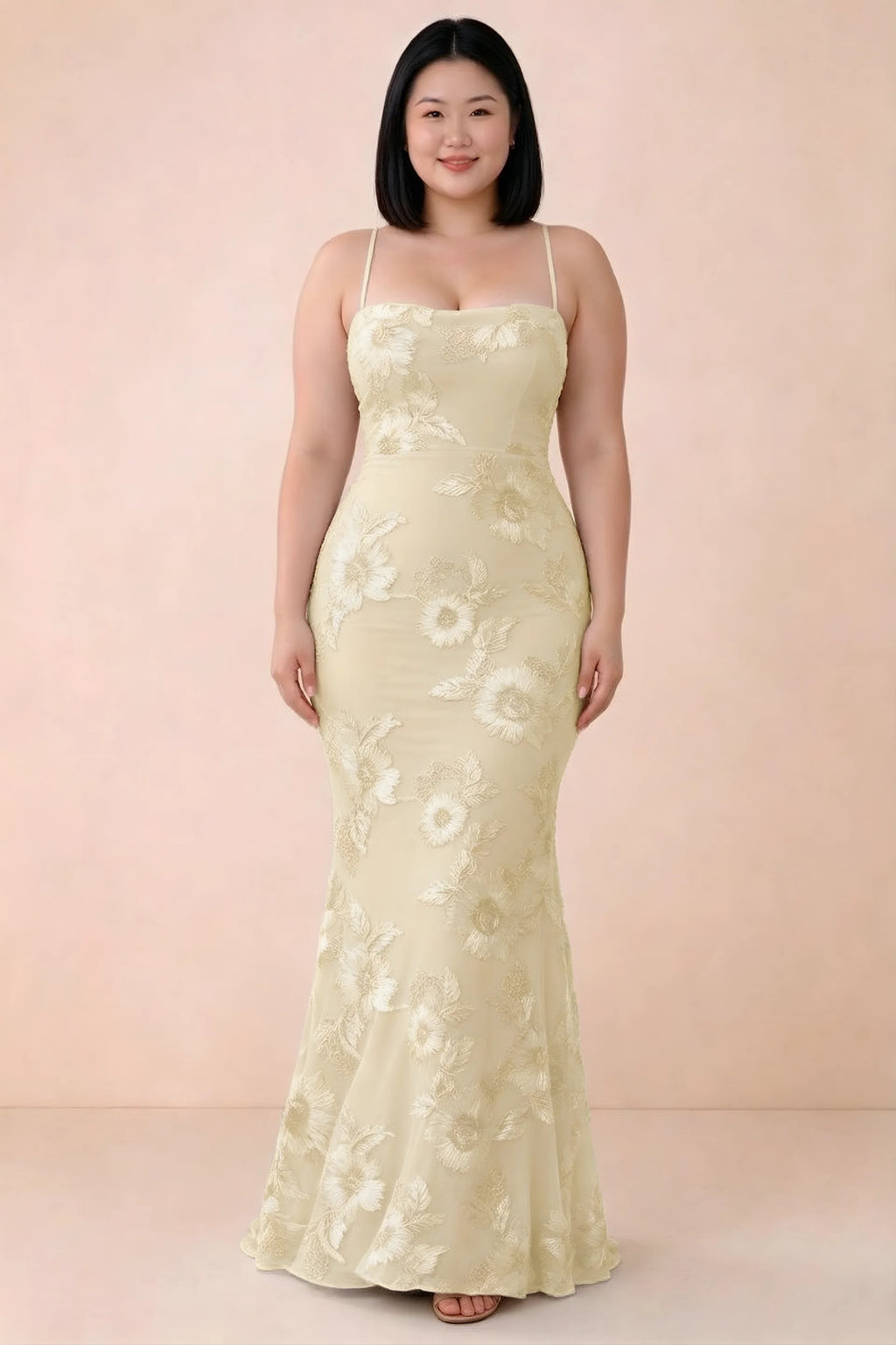Front studio view of Belinda lemon floral maxi dress showing the close-fitting bodice and long skirt