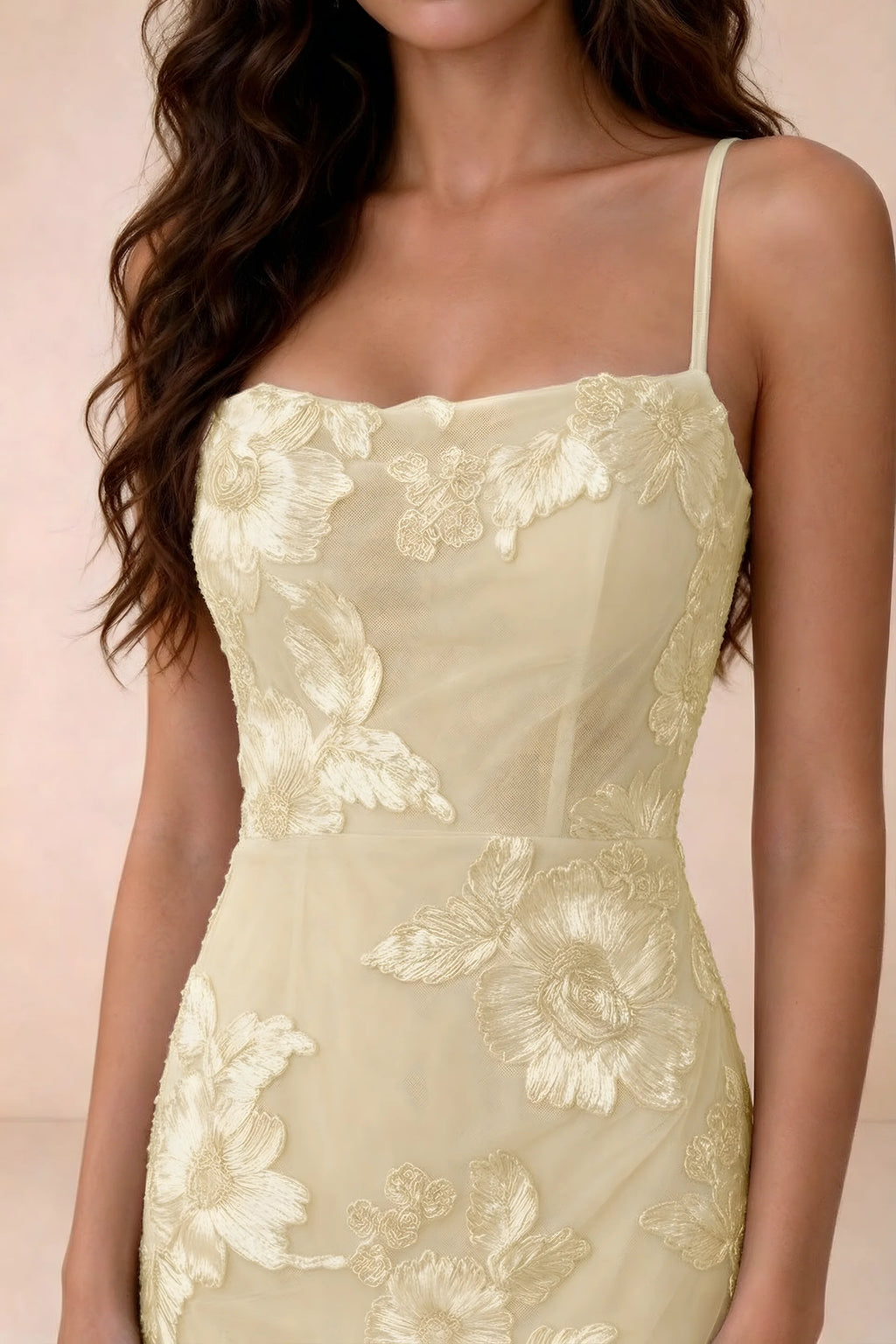Close-up of Belinda lemon straight neckline, spaghetti straps and raised floral details