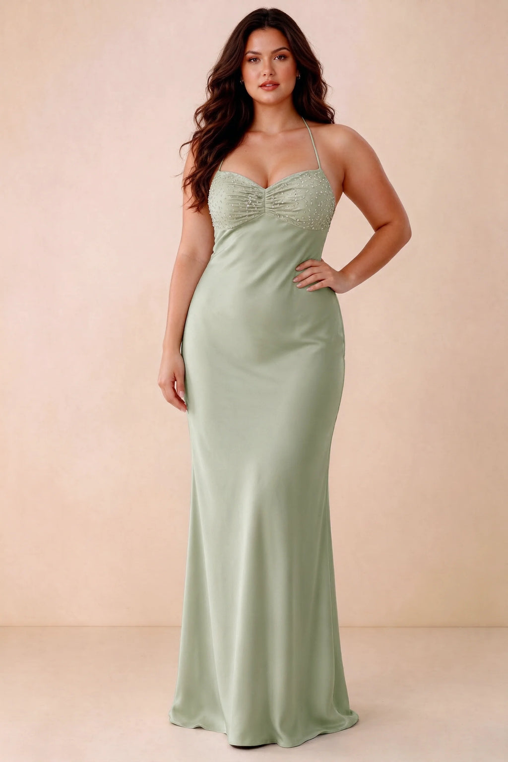 Front studio view of Blanche light green maxi dress showing the ruched beaded bodice and smooth skirt