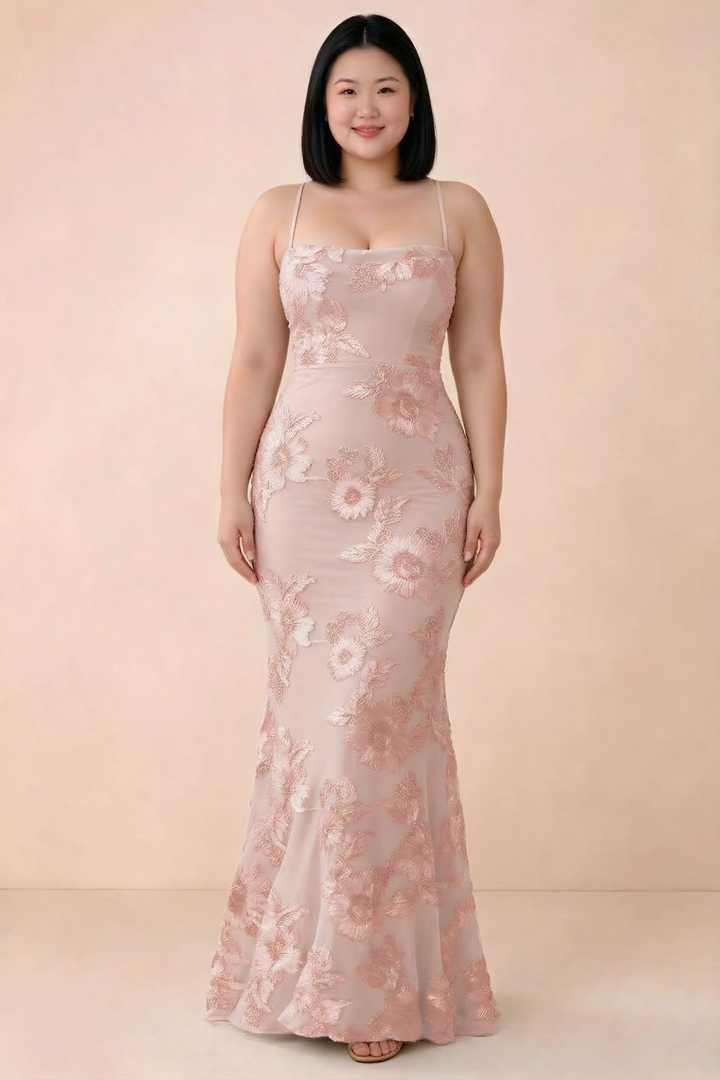 Front studio view of Belinda light pink floral maxi dress showing the close-fitting bodice and long skirt