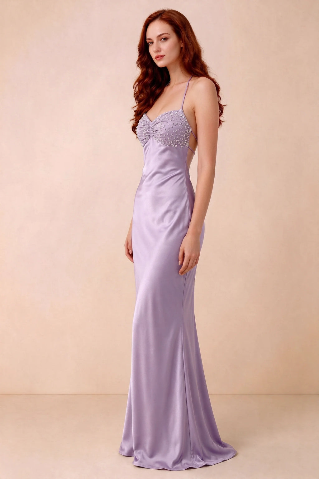 Three-quarter studio view of Blanche lilac dress showing the fitted hips and flared long hem