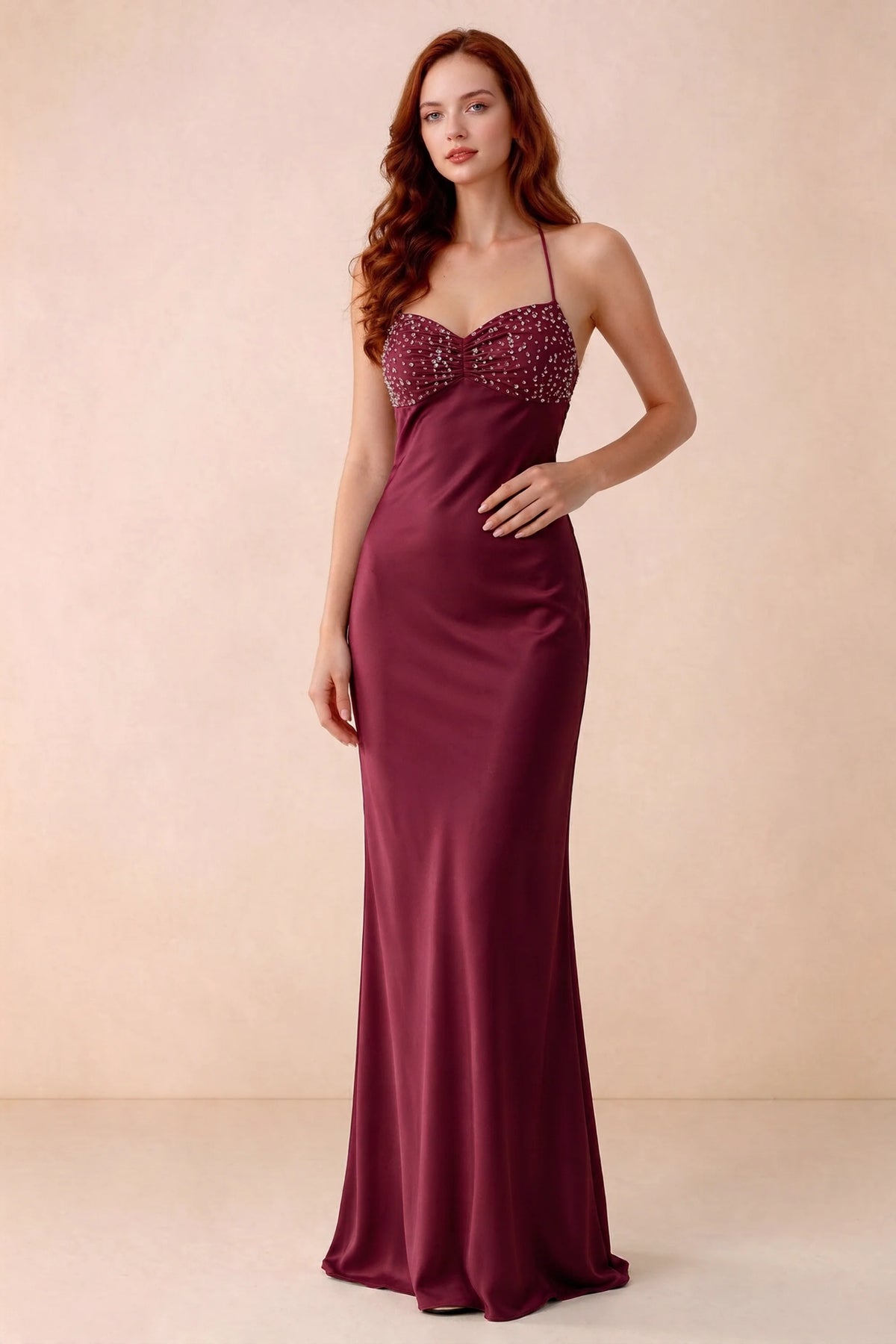 Front studio view of Blanche merlot satin beaded maxi dress showing the sweetheart bodice and mermaid skirt