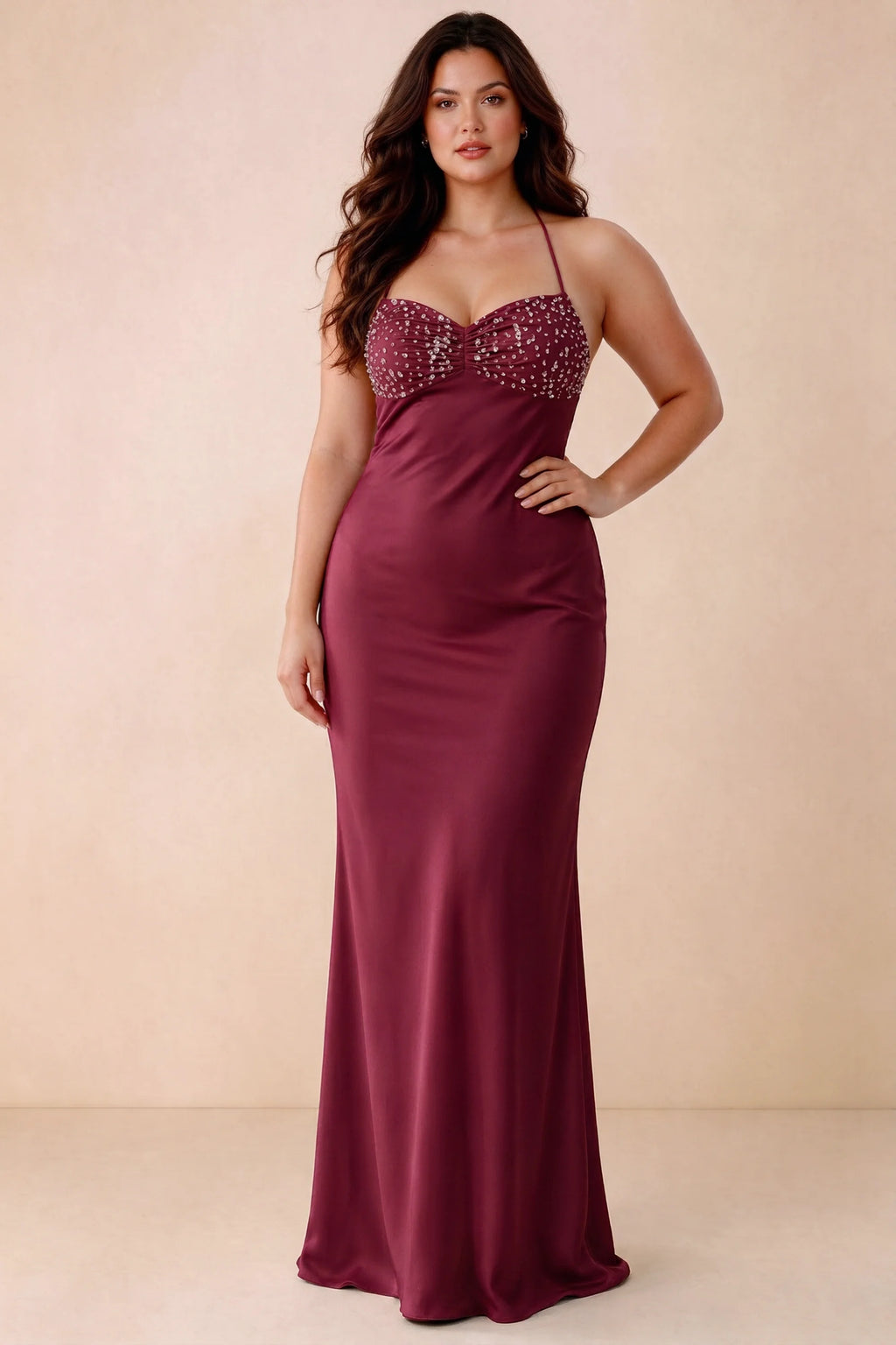 Front studio view of Blanche merlot maxi dress showing the ruched beaded bodice and smooth skirt