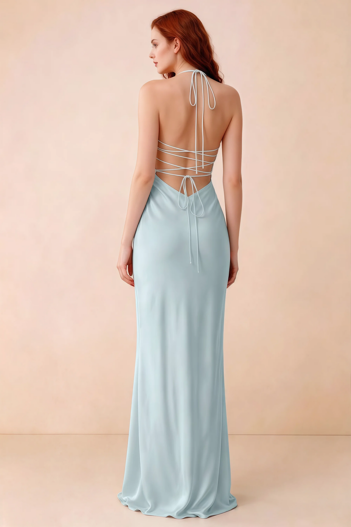 Back studio view of Blanche mist dress showing halter neck ties and crossed open-back lacing