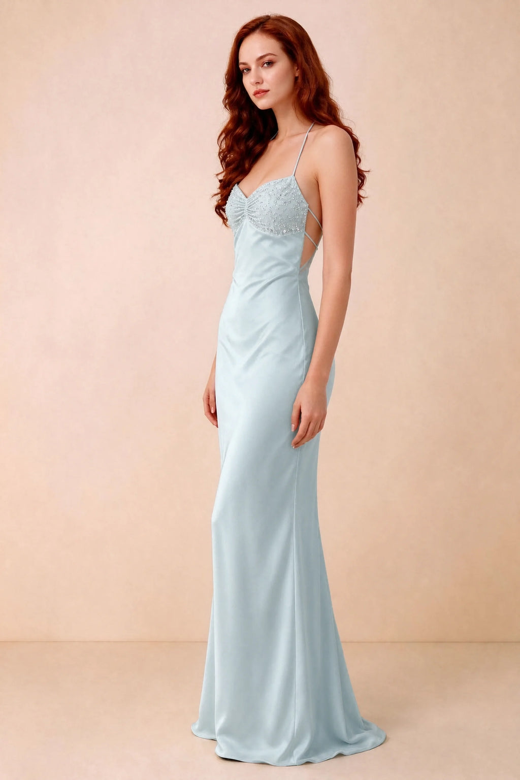 Three-quarter studio view of Blanche mist dress showing the fitted hips and flared long hem