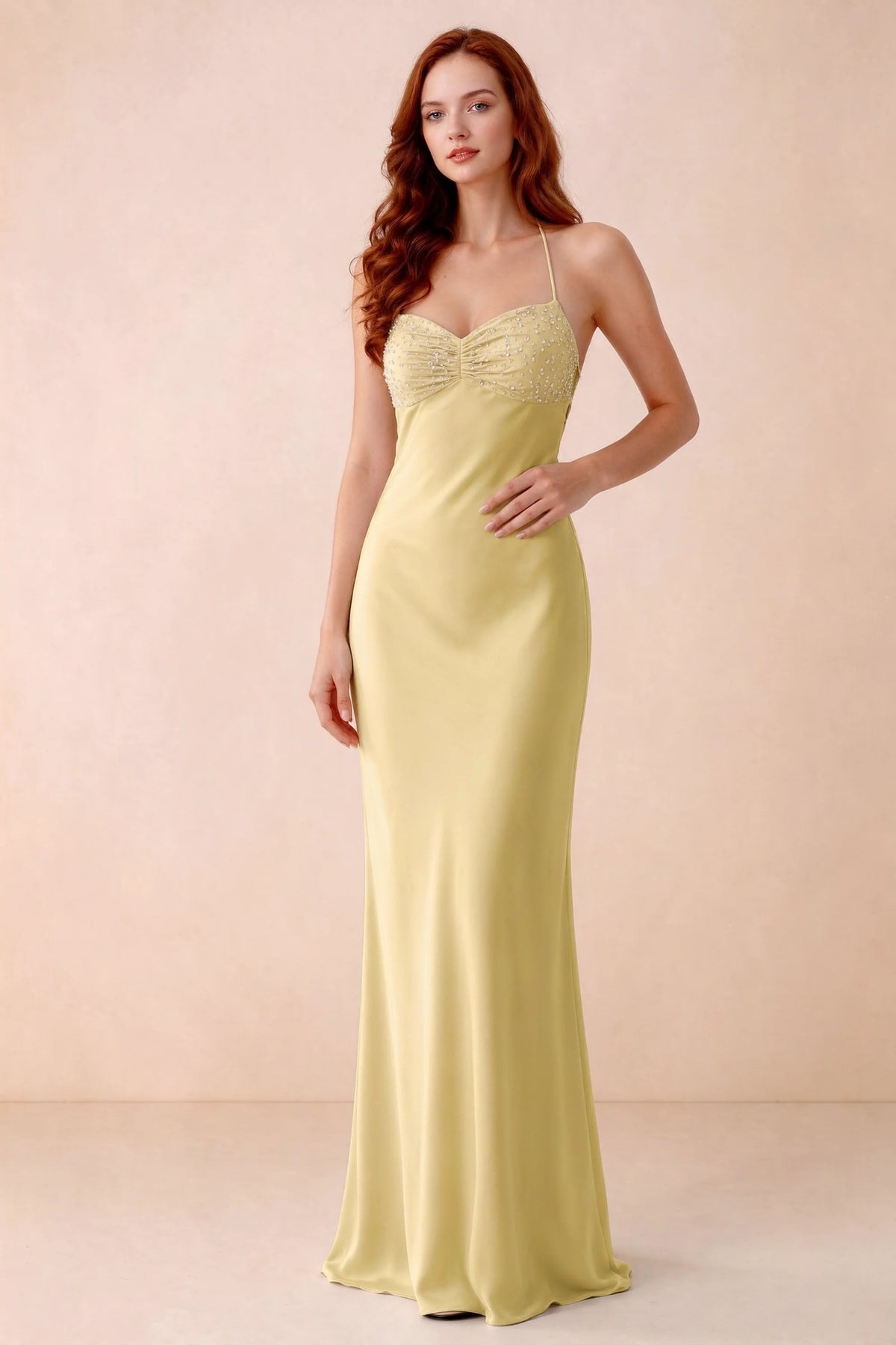 Front studio view of Blanche pastel yellow satin beaded maxi dress showing the sweetheart bodice and mermaid skirt