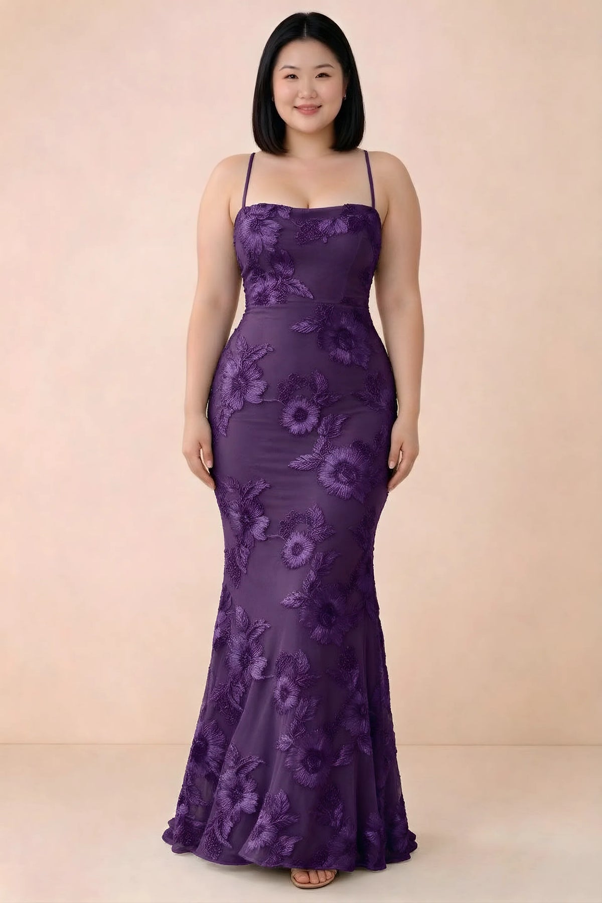 Front studio view of Belinda plum floral maxi dress showing the close-fitting bodice and long skirt
