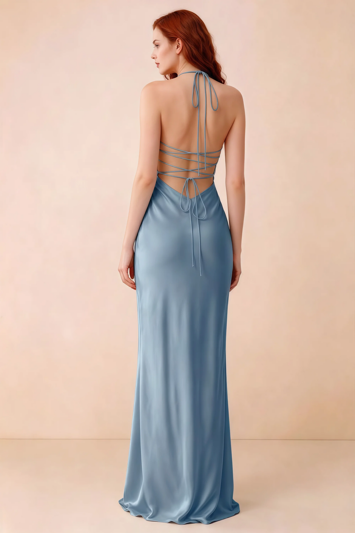 Back studio view of Blanche powder blue dress showing halter neck ties and crossed open-back lacing