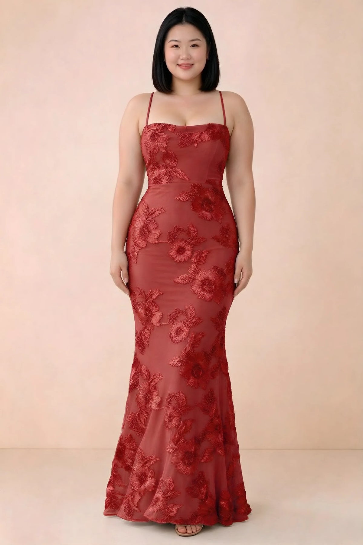 Front studio view of Belinda red floral maxi dress showing the close-fitting bodice and long skirt