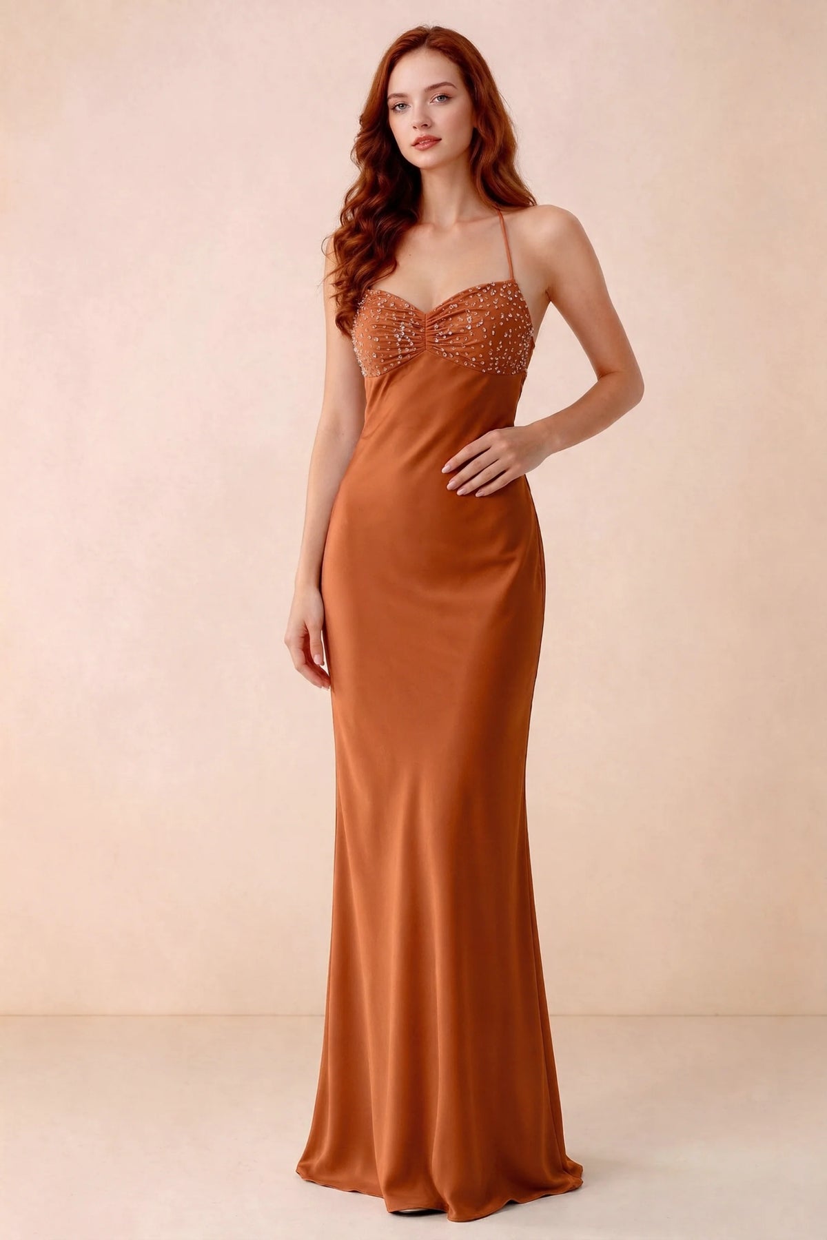 Front studio view of Blanche rust satin beaded maxi dress showing the sweetheart bodice and mermaid skirt