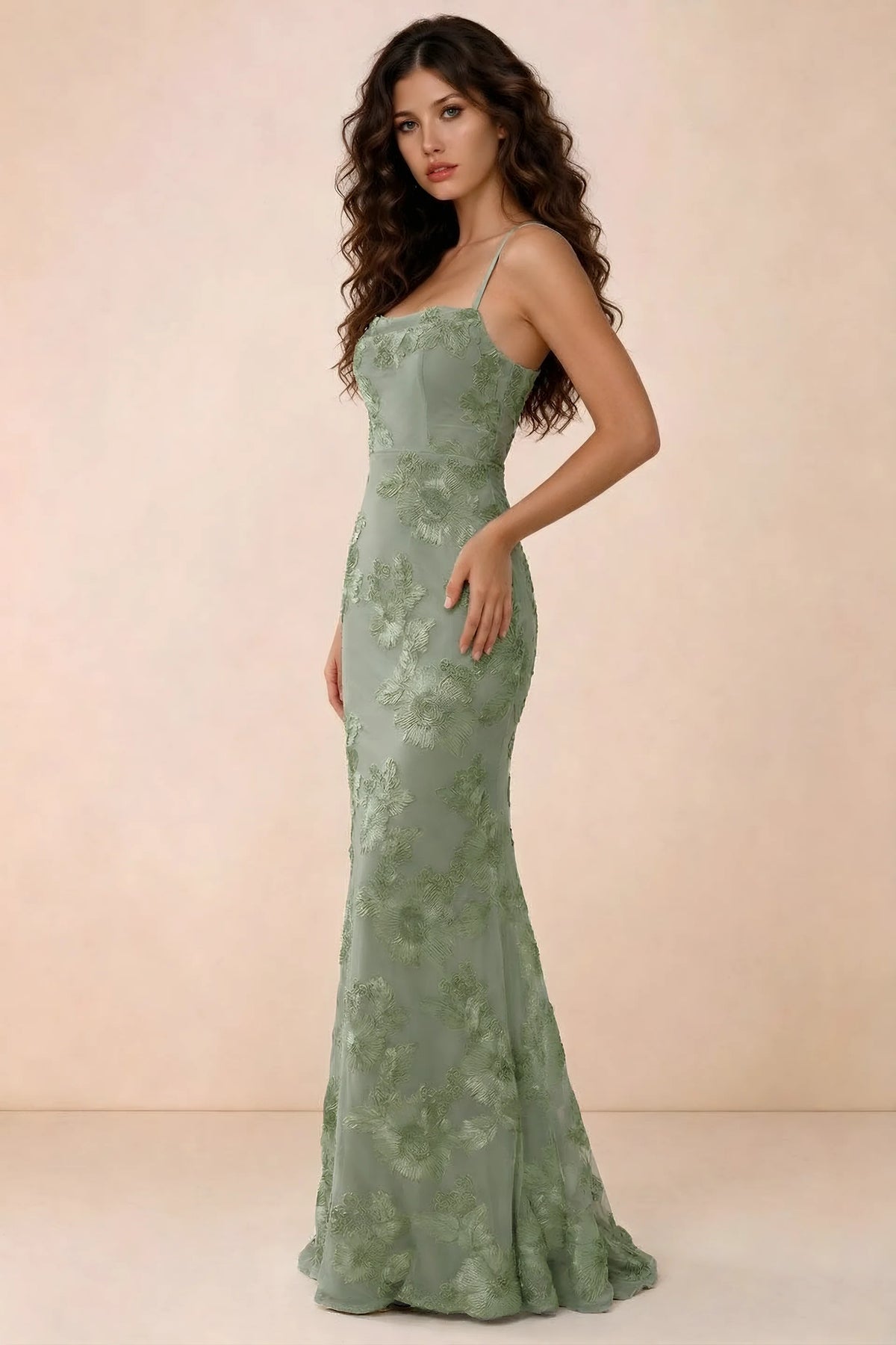 Three-quarter studio view of Belinda sage green dress showing the fitted waist and flared mermaid hem