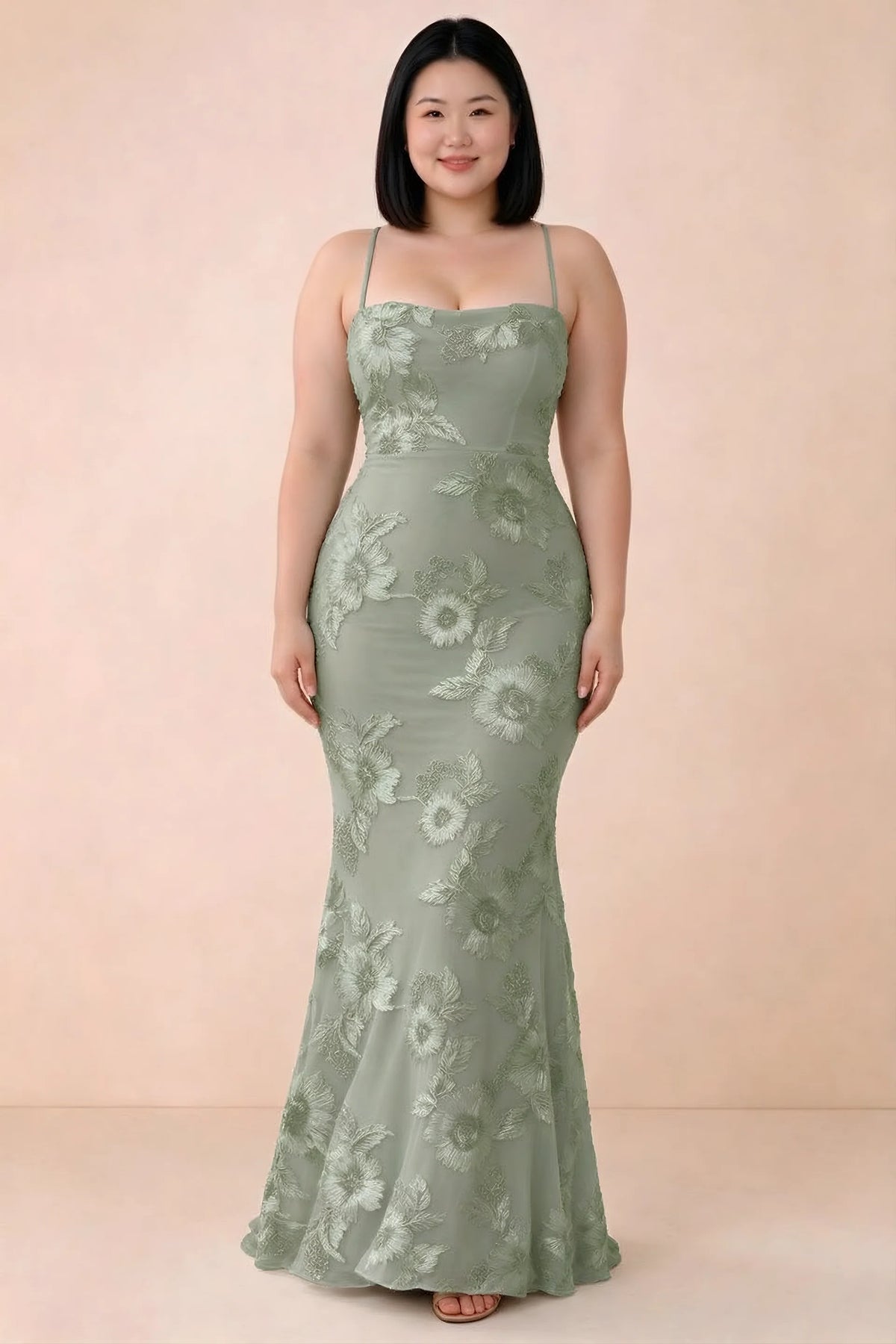 Front studio view of Belinda sage green floral maxi dress showing the close-fitting bodice and long skirt