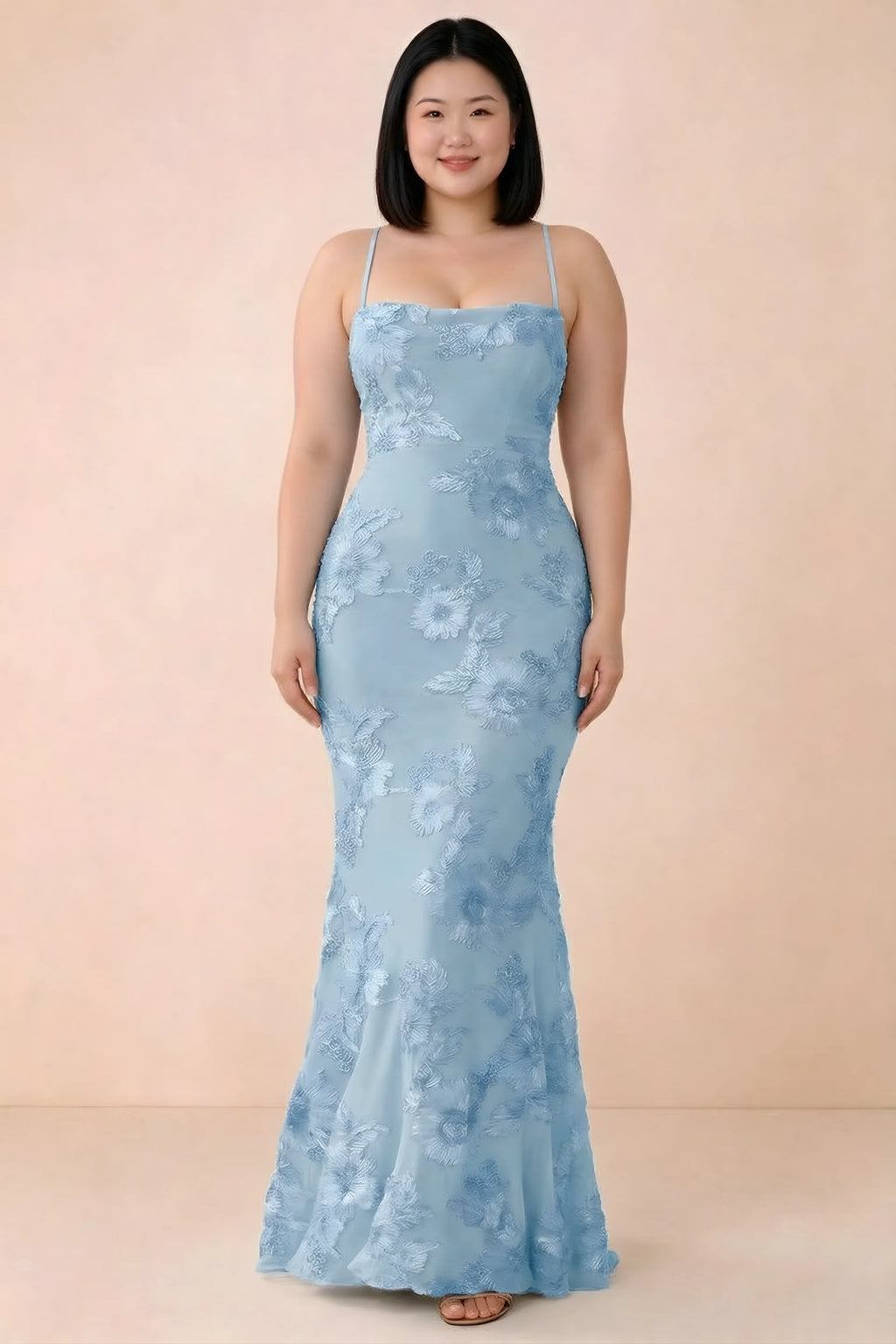 Front studio view of Belinda sky blue floral maxi dress showing the close-fitting bodice and long skirt
