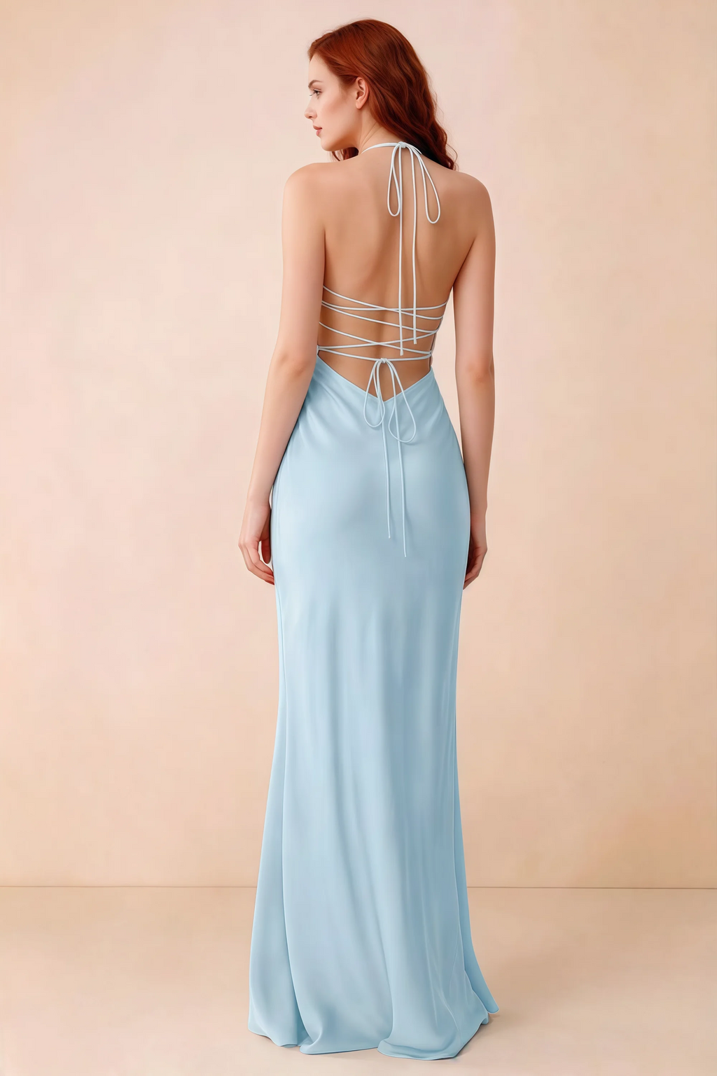 Back studio view of Blanche sky blue dress showing halter neck ties and crossed open-back lacing