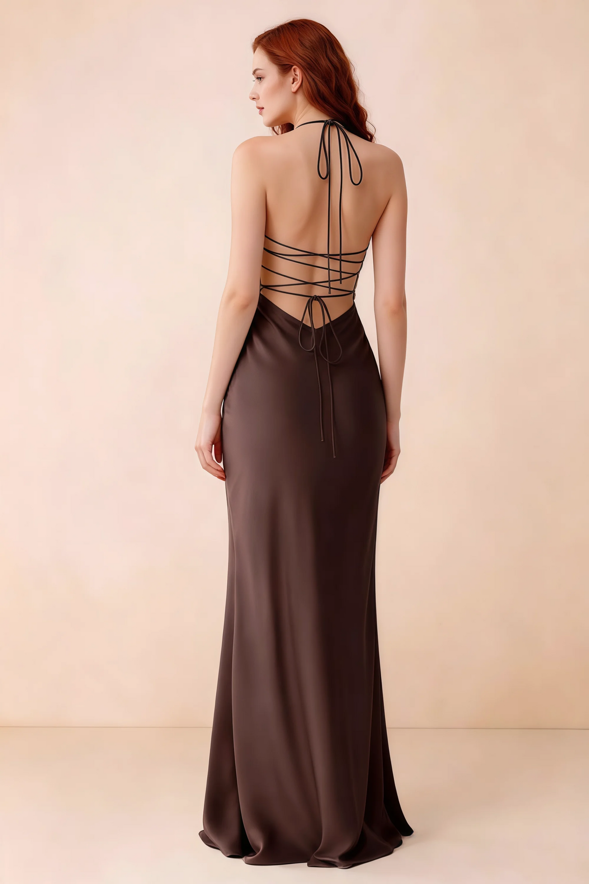 Back studio view of Blanche truffle dress showing halter neck ties and crossed open-back lacing