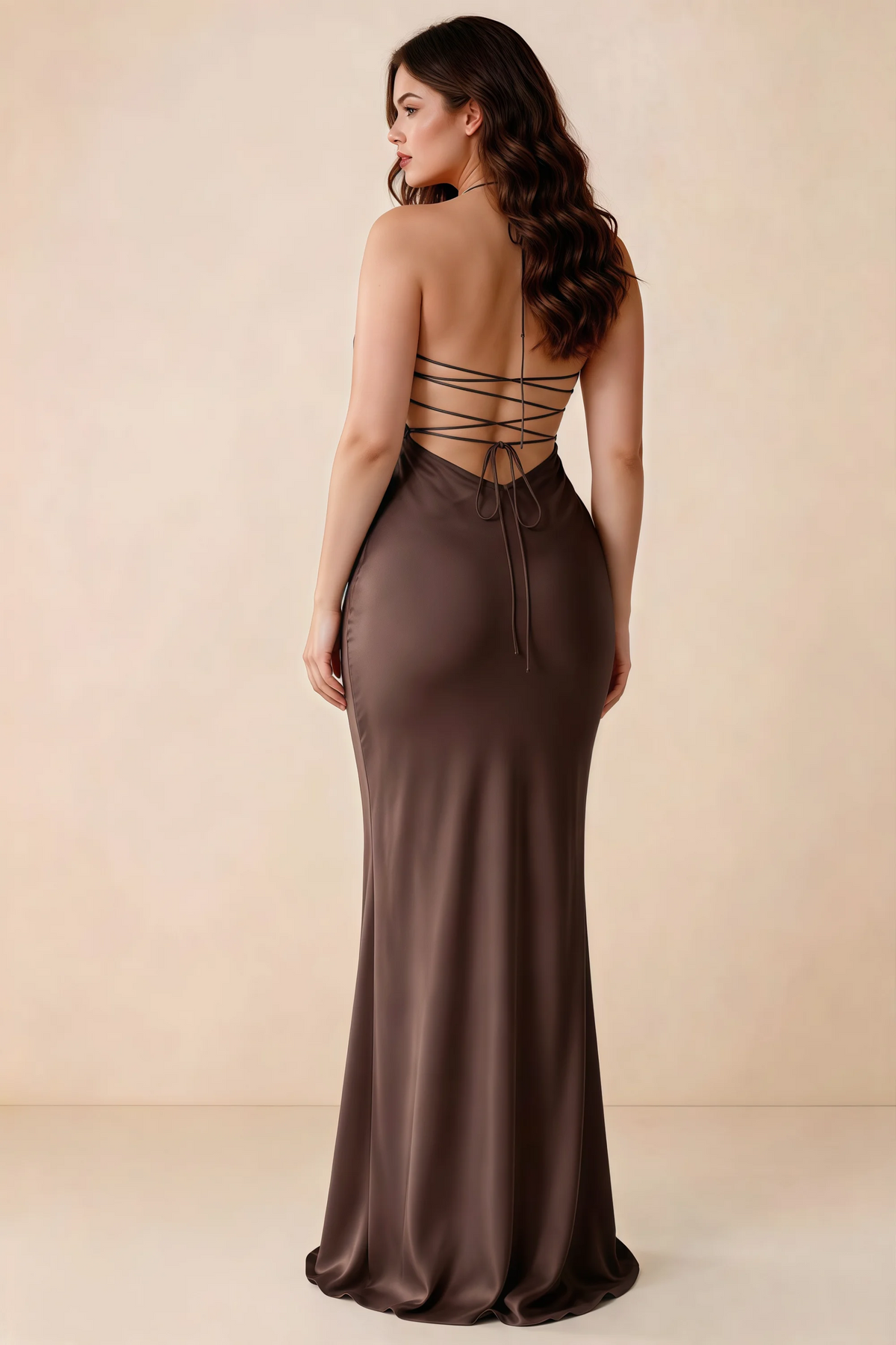 Rear studio view of Blanche truffle satin dress showing the open back and mermaid silhouette